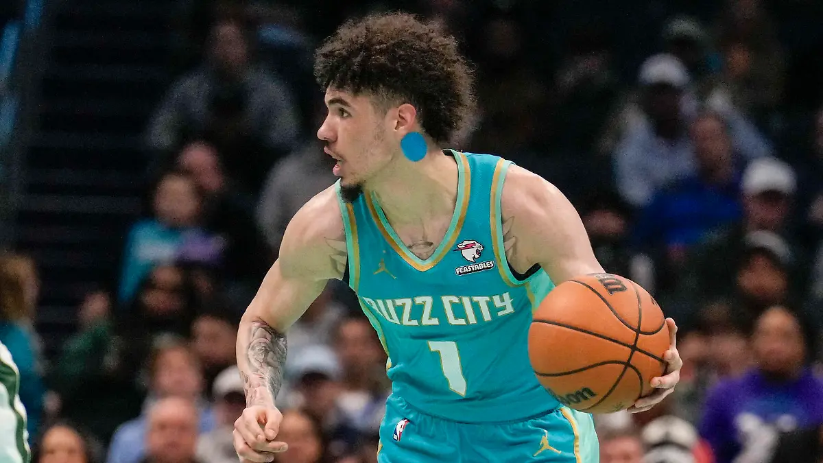 Nov 17, 2023; Charlotte, North Carolina, USA; Charlotte Hornets guard LaMelo Ball (1) brings the ball up court against the Milwaukee Bucks during the first quarter at the Spectrum Center. Mandatory Credit: Jim Dedmon-USA TODAY Sports