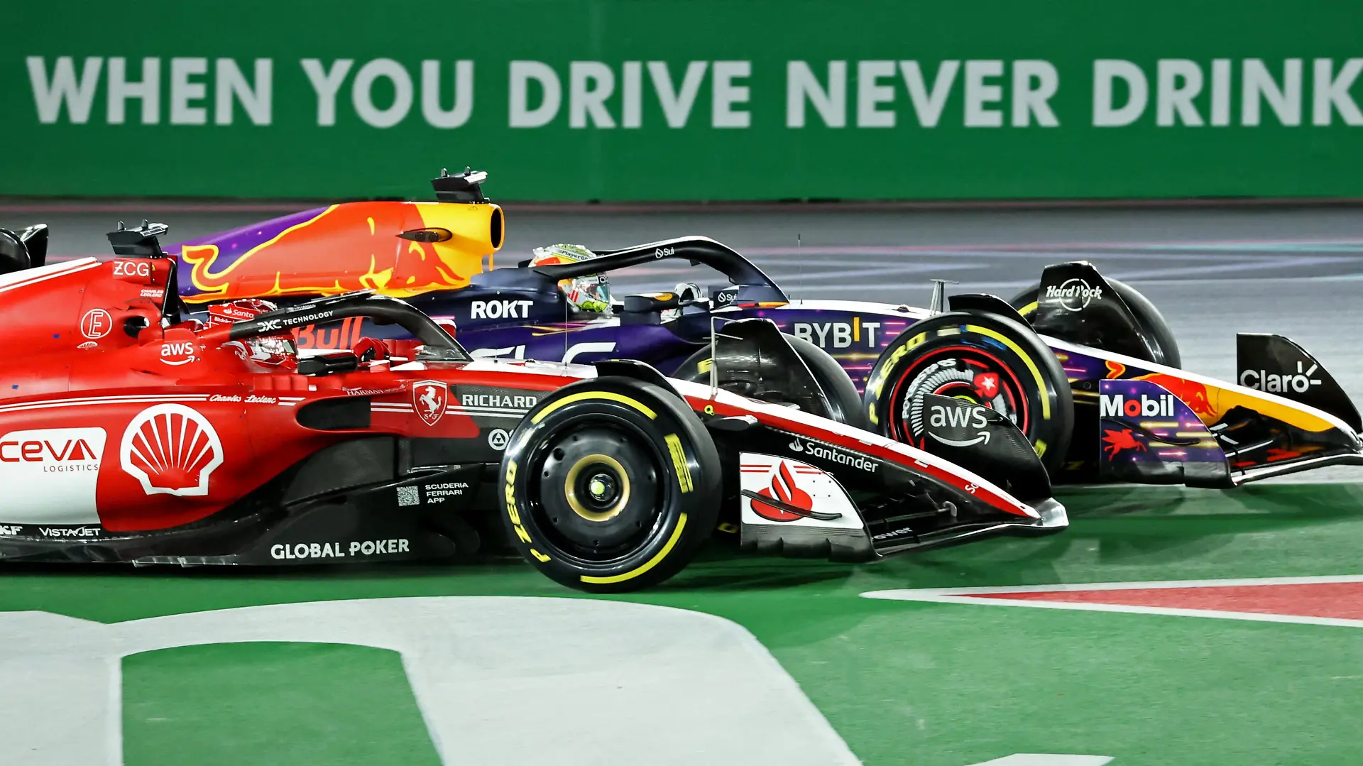 Formula One F1 - Las Vegas Grand Prix - Las Vegas Strip Circuit, Las Vegas, Nevada, U.S - November 18, 2023 Red Bull's Max Verstappen and Ferrari's Charles Leclerc in action during the race REUTERS/Mike Blake
