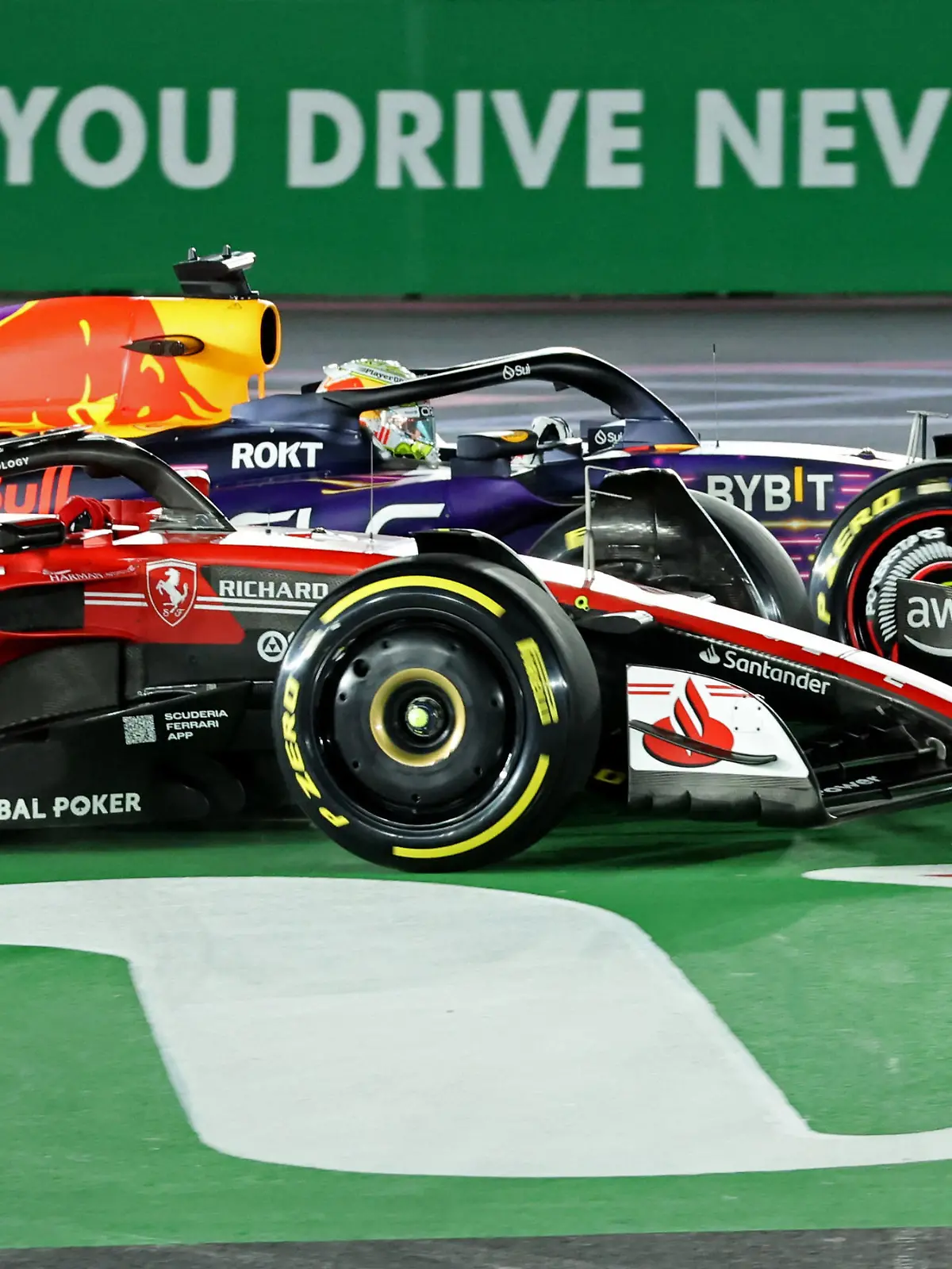 Formula One F1 - Las Vegas Grand Prix - Las Vegas Strip Circuit, Las Vegas, Nevada, U.S - November 18, 2023 Red Bull's Max Verstappen and Ferrari's Charles Leclerc in action during the race REUTERS/Mike Blake