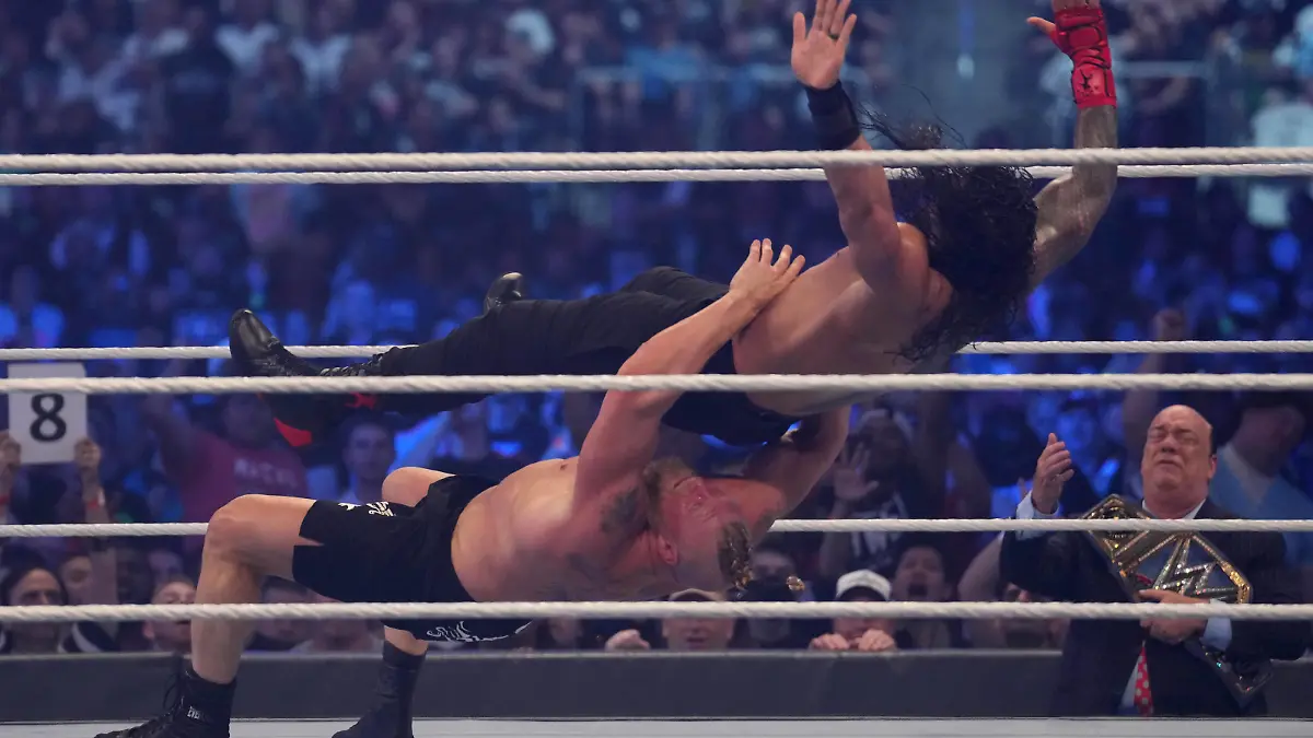 Wrestling: WWE-Wrestlemania, Apr 3, 2022 Arlington, TX, USA Roman Reigns black pants and Brock Lesnar black shorts wrestling during their championship unification bout during WrestleMania at AT&ampT Stadium. Mandatory Credit: Joe Camporeale-USA TODAY Sports, 03.04.2022 22:38:16, 18017279, Brock Lesnar, Wrestling, AT&ampT Stadium, Wrestlemania PUBLICATIONxINxGERxSUIxAUTxONLY Copyright: xJoexCamporealex 18017279