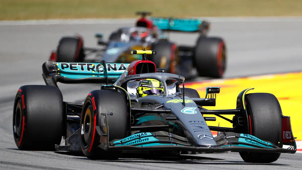 Mercedes driver Lewis Hamilton of Britain leads his teammate George Russell of Britain during the qualifying session at the Barcelona Catalunya racetrack in Montmelo, Spain, Saturday, May 21, 2022. The Formula One race will be held on Sunday. (AP Photo/Joan Monfort)