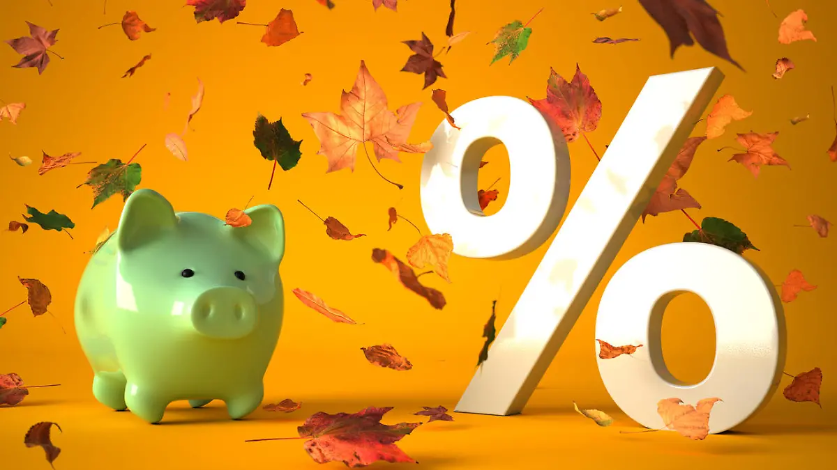 Piggy bank with white percent in autumn leaves. 3d illustration.