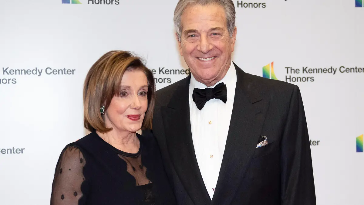 FILE - Speaker of the House Nancy Pelosi, D-Calif., and her husband, Paul Pelosi, arrive at the State Department for the Kennedy Center Honors State Department Dinner, Dec. 7, 2019, in Washington. House Speaker Nancy Pelosi’s husband, Paul, was “violently assaulted” by an assailant who broke into their San Francisco home early Friday, Oct. 28, 2022, and he is now in the hospital and expected to make a full recovery, said her spokesman, Drew Hammill. (AP Photo/Kevin Wolf, File)