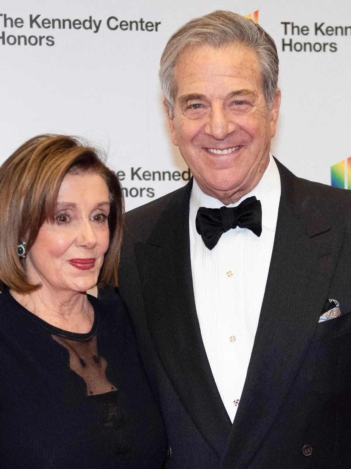 FILE - Speaker of the House Nancy Pelosi, D-Calif., and her husband, Paul Pelosi, arrive at the State Department for the Kennedy Center Honors State Department Dinner, Dec. 7, 2019, in Washington. House Speaker Nancy Pelosi’s husband, Paul, was “violently assaulted” by an assailant who broke into their San Francisco home early Friday, Oct. 28, 2022, and he is now in the hospital and expected to make a full recovery, said her spokesman, Drew Hammill. (AP Photo/Kevin Wolf, File)