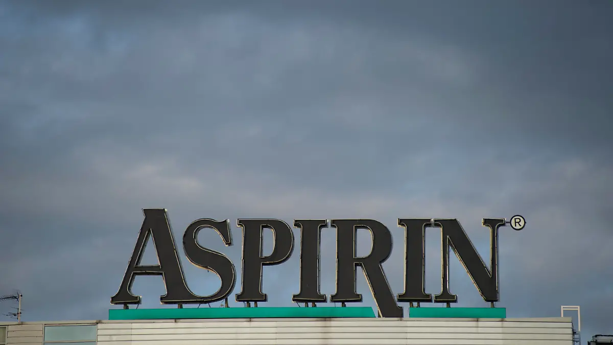 Aspirin logo is seen against rain clouds on October 7, 2020 in Warsaw, Poland. (Photo by Aleksander Kalka/NurPhoto)
