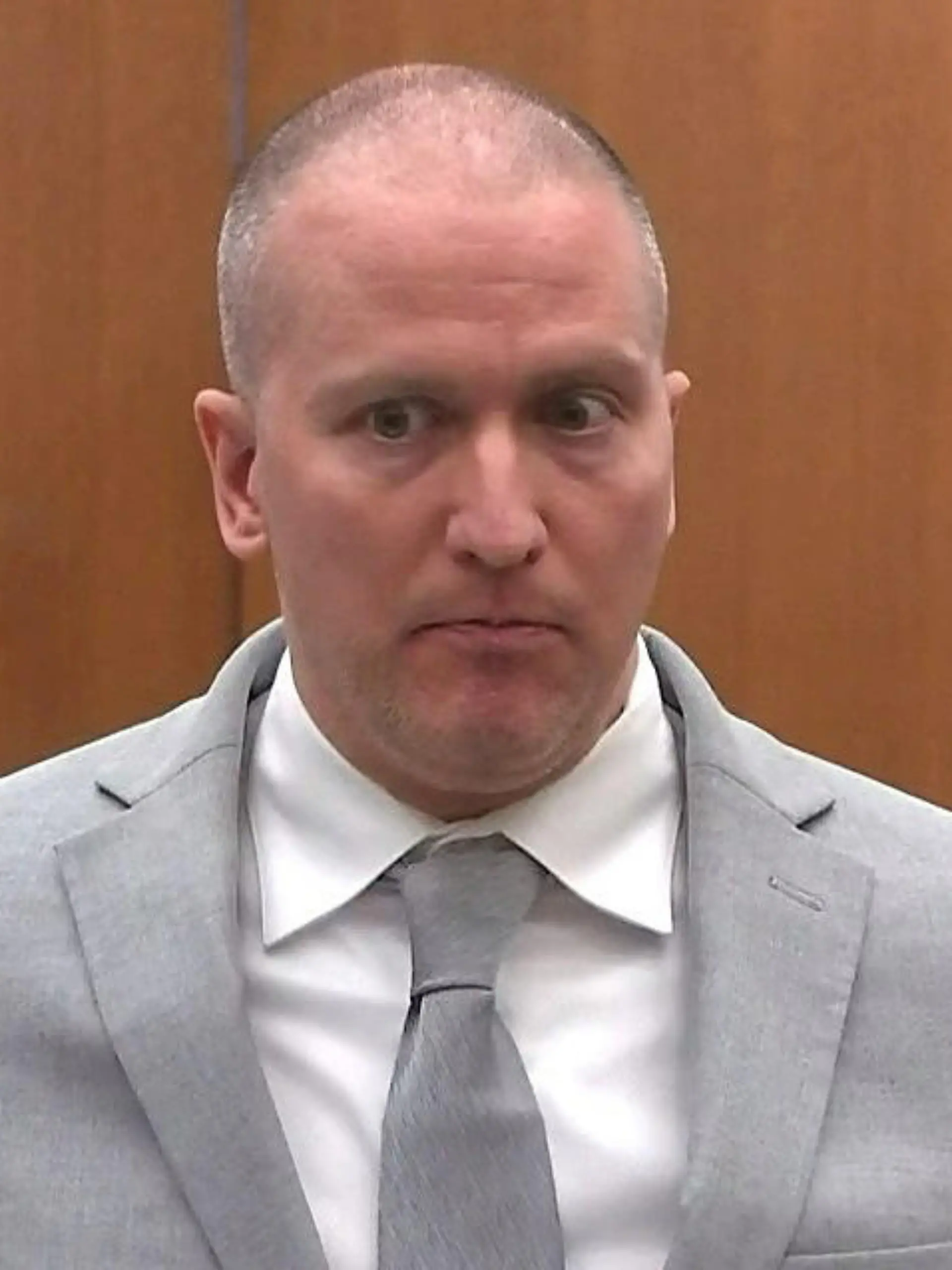 FILE PHOTO: Former Minneapolis police officer Derek Chauvin addresses his sentencing hearing and the judge as he awaits his sentence after being convicted of murder in the death of George Floyd in Minneapolis, Minnesota, U.S. June 25, 2021 in a still image from video. Pool via REUTERS/File Photo