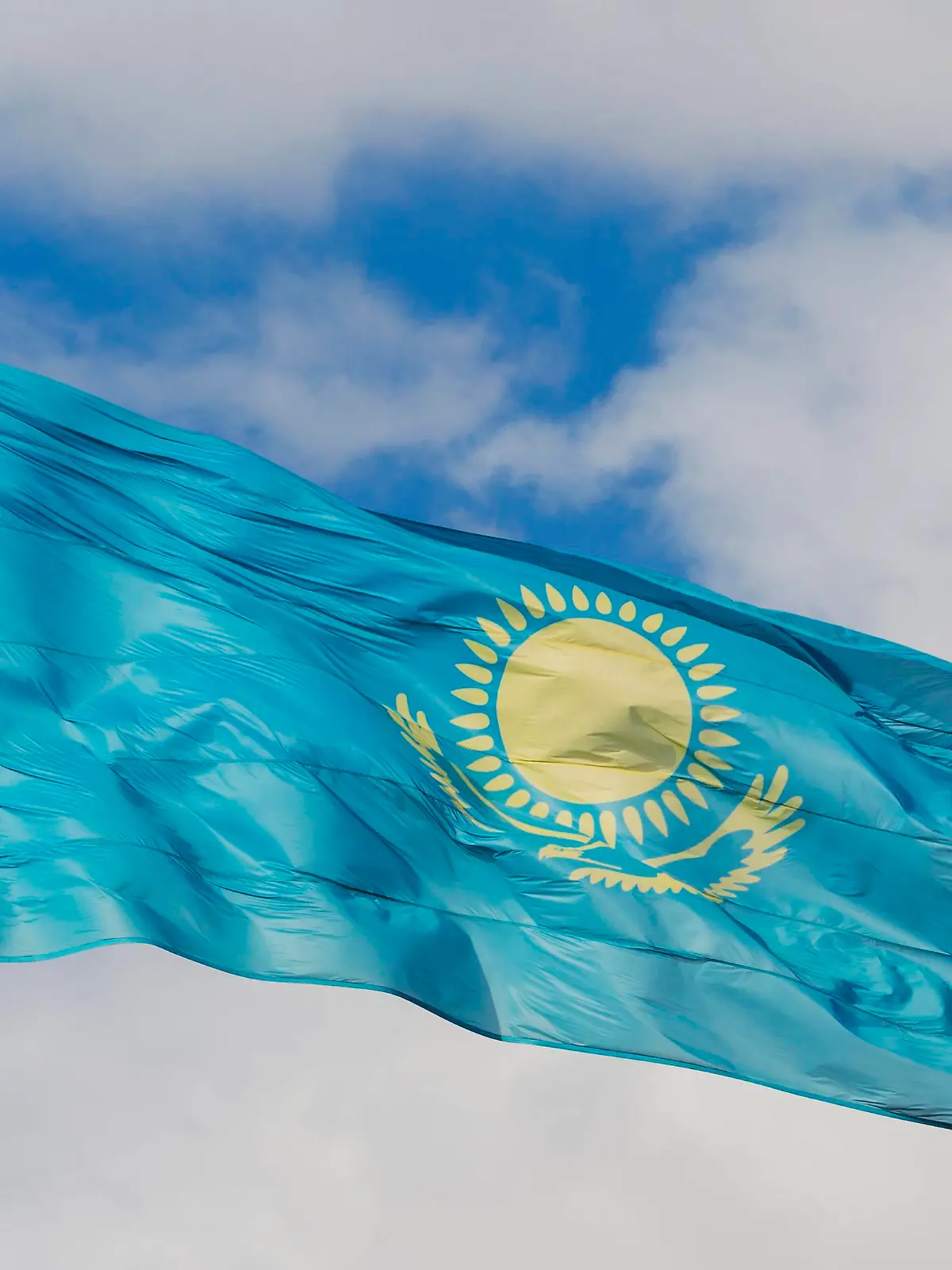 Kazakhstan national flag in the wind, Independence Park, Shymkent, South Region, Kazakhstan, Central Asia