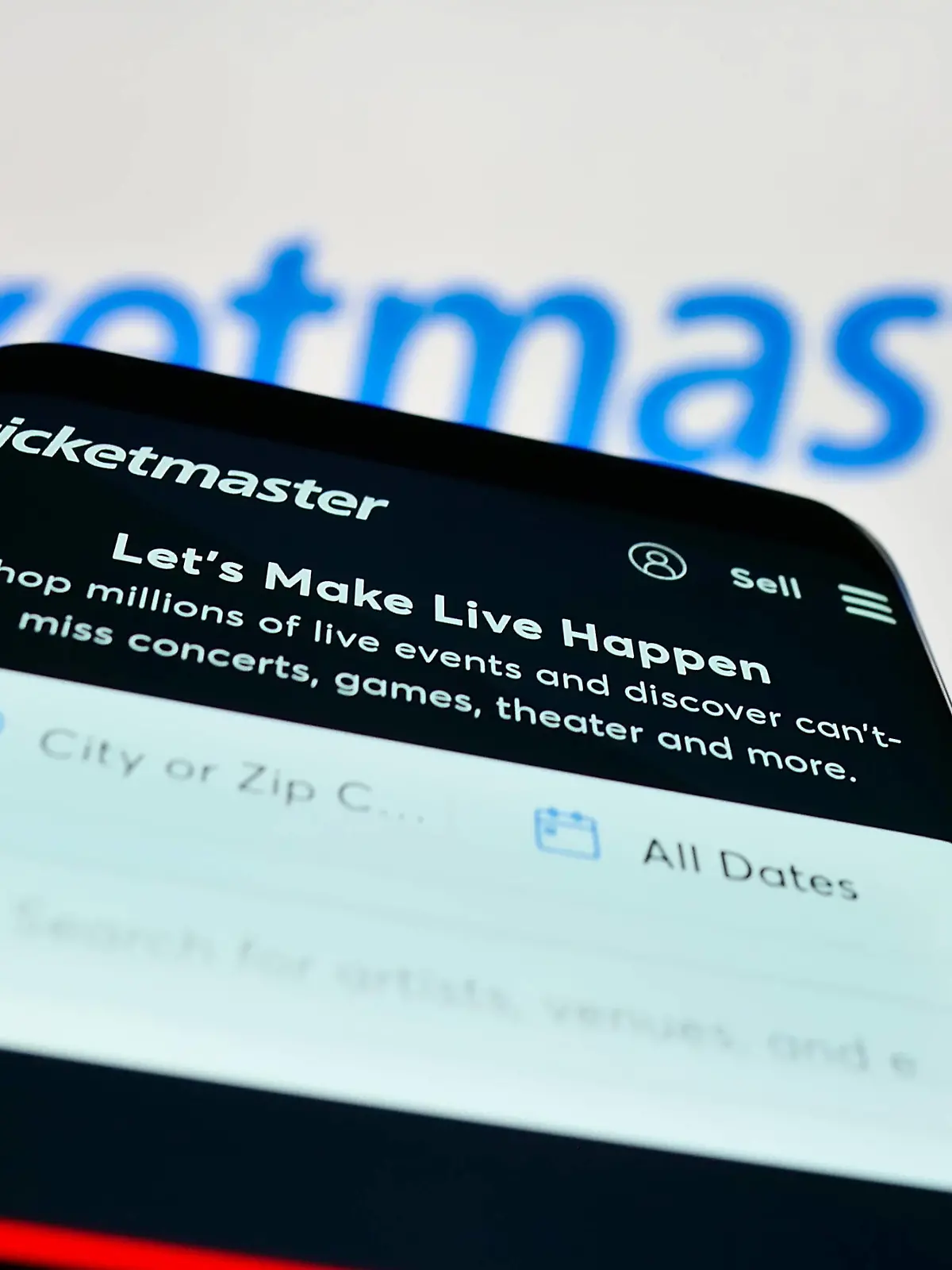 Mobile phone with website of US company Ticketmaster Entertainment Inc. on screen. Stuttgart, Germany - 12-02-2022: Mobile phone with website of US company Ticketmaster Entertainment Inc. on screen in front of business logo. Focus on top-left of phone display. Copyright: xZoonar.com/TimonxSchneiderx 19528398