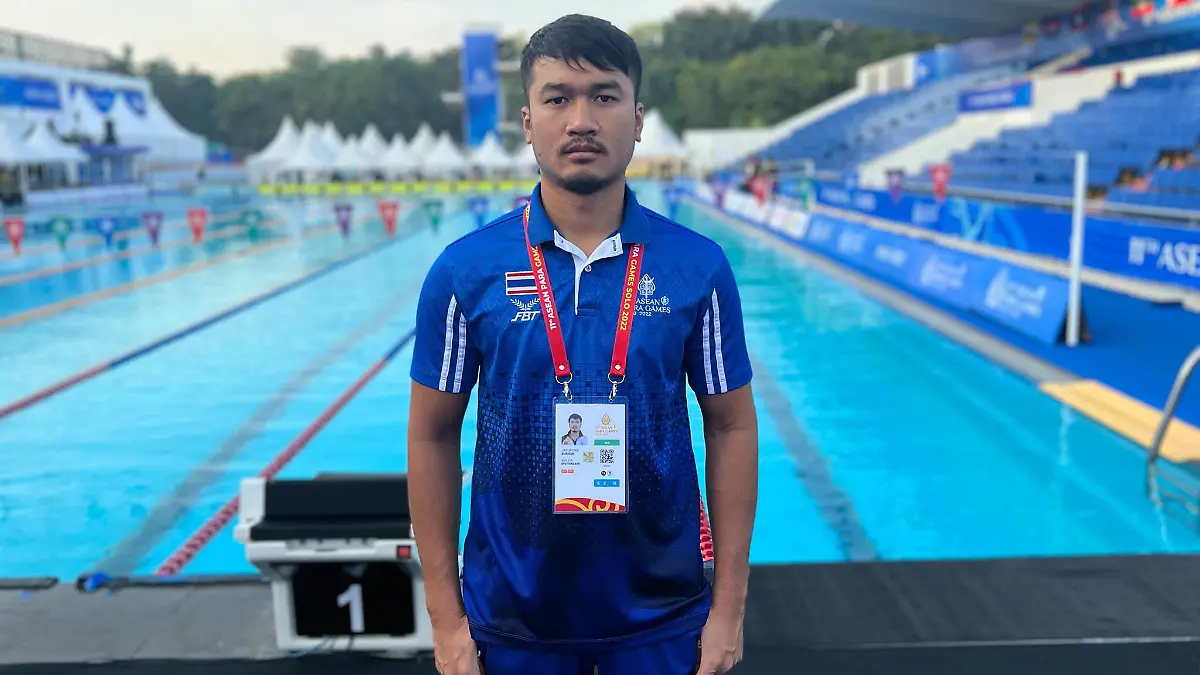A champion Paralympian swimmer killed four people including his bride before turning the gun on himself at his own wedding reception.
Chaturong Suksuk, 29, (PICTURED) a disabled former policeman, was married to his girlfriend of three years Kanchana Pachantuek, 44, in a traditional wedding attended by overjoyed family and friends in Nakhon Ratchasima province, Thailand, on November 25.
PACKAGE: Video, pictures, text