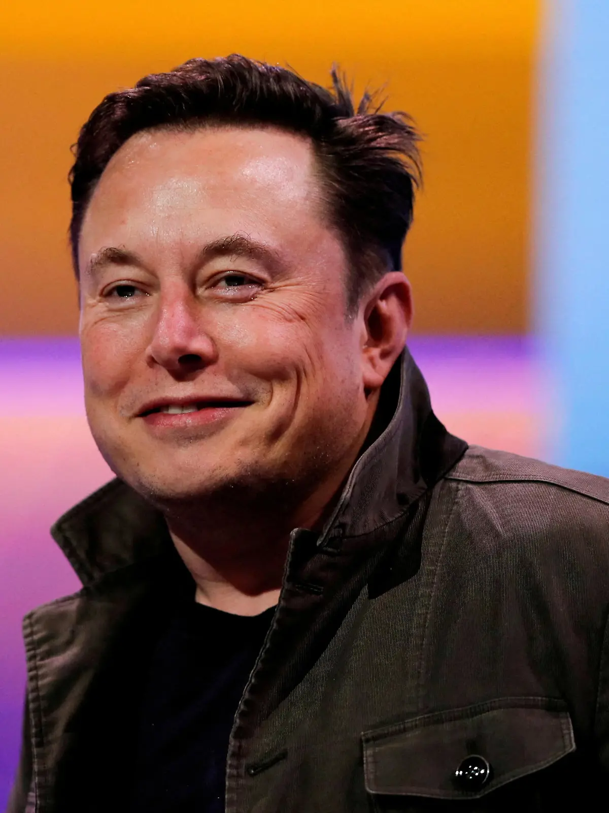 FILE PHOTO: SpaceX owner and Tesla CEO Elon Musk smiles at the E3 gaming convention in Los Angeles, California, U.S., June 13, 2019.  REUTERS/Mike Blake/File Photo