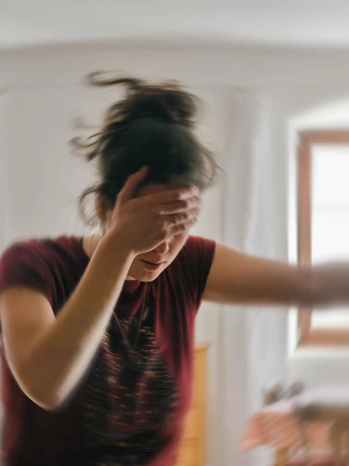 Woman suffering from vertigo or dizziness or other health problem of brain or inner ear.