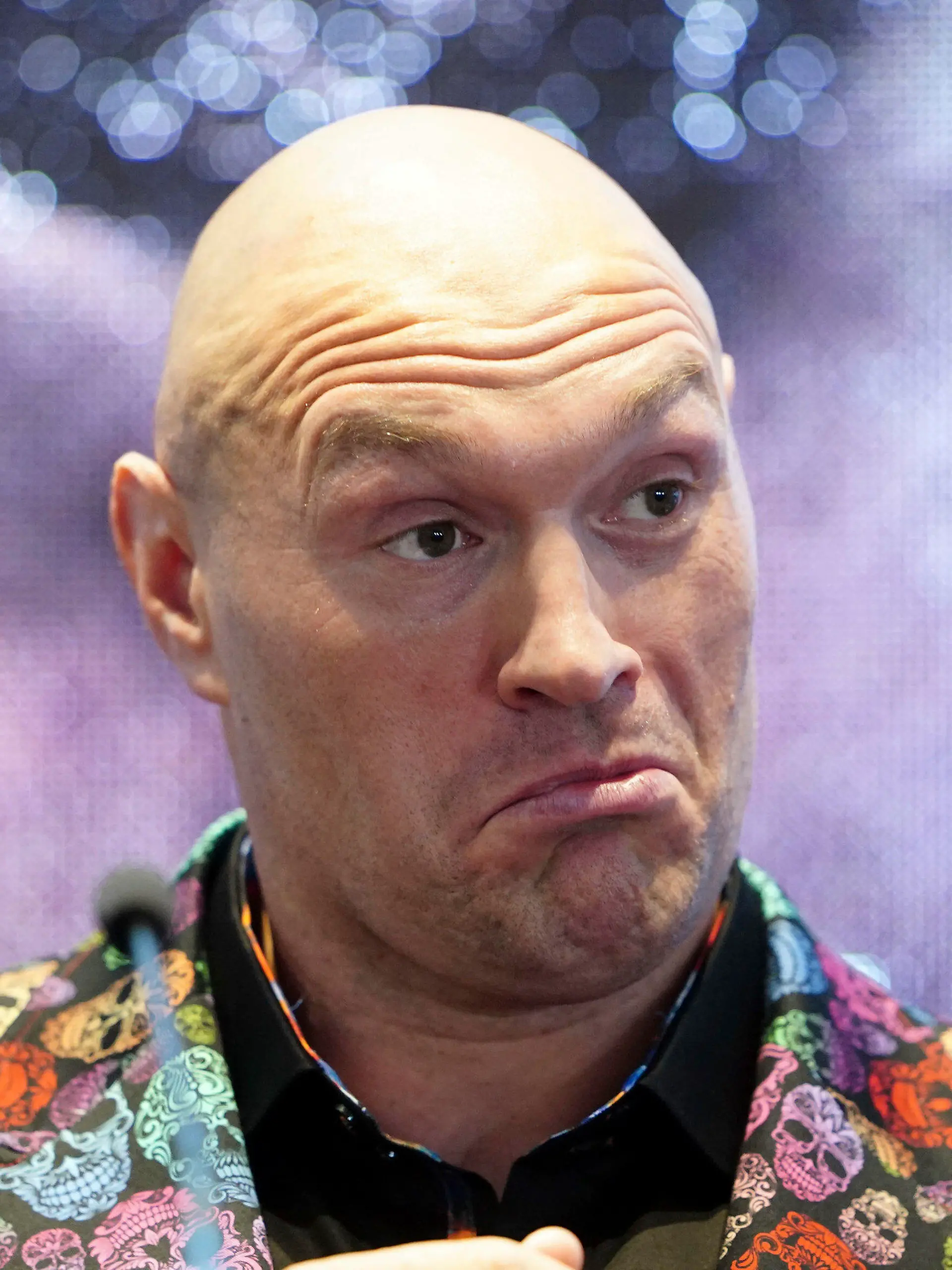 Britain's Tyson Fury attends a press conference at the Tottenham Hotspur Stadium, London Thursday, Oct. 20, 2022. Tyson Fury will defend his world heavyweight boxing title against Derek Chisora at the Tottenham Hotspur Stadium on Dec. 3, 2022. (Zac Goodwin/PA via AP)