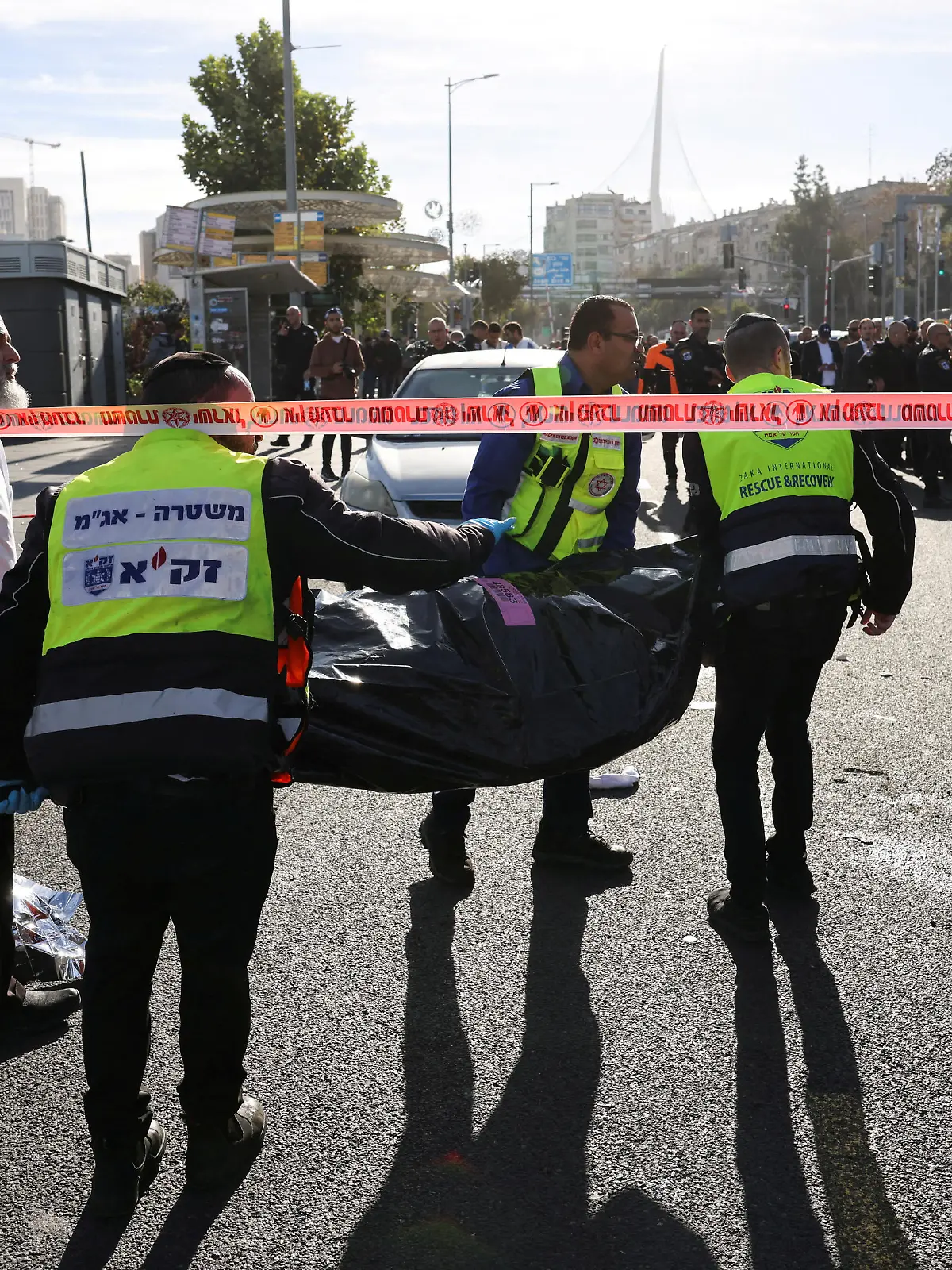 Israeli officials work at the scene of a violent incident in Jerusalem November 30, 2023 REUTERS/Ronen Zvulun