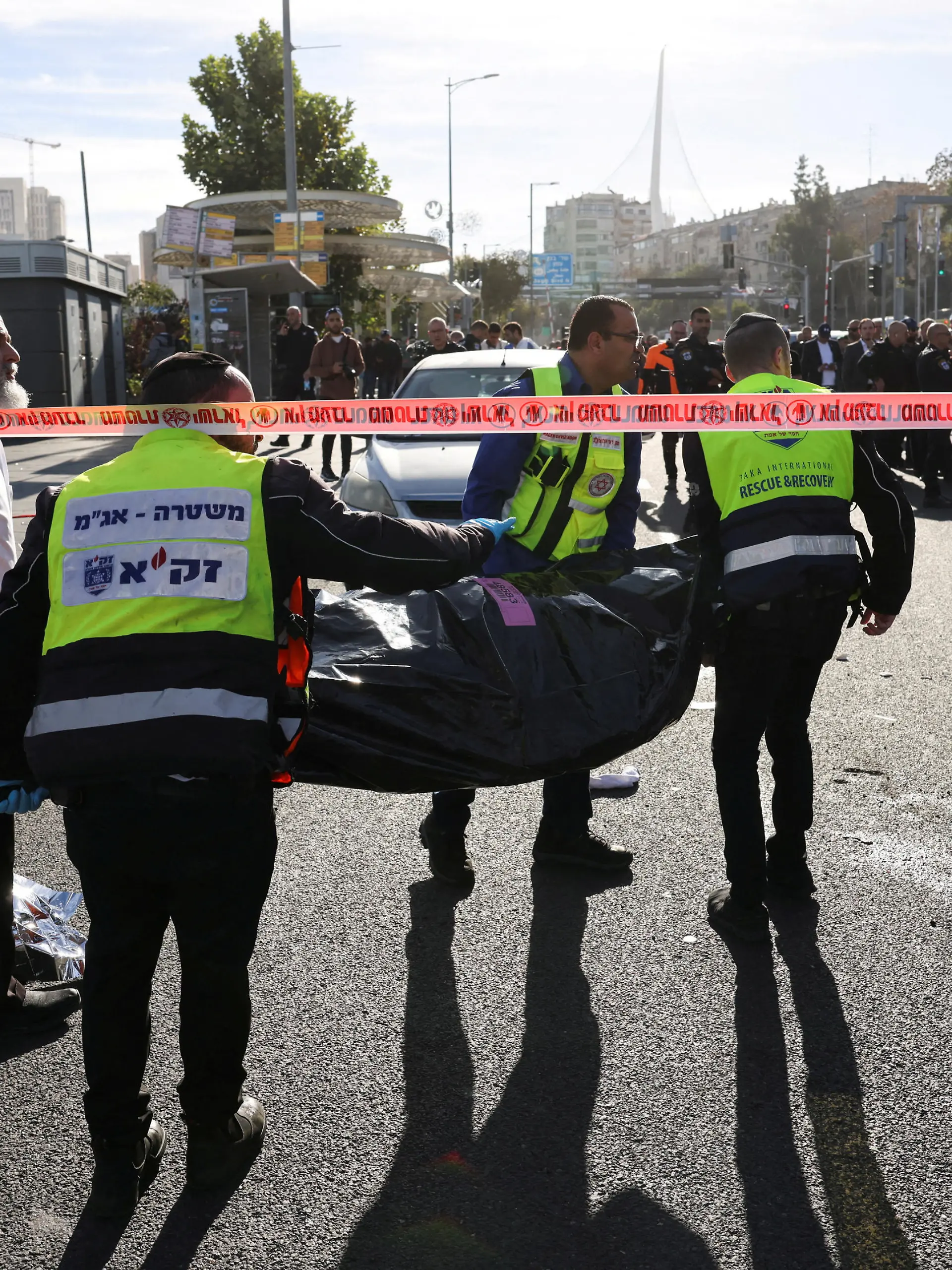 Israeli officials work at the scene of a violent incident in Jerusalem November 30, 2023 REUTERS/Ronen Zvulun