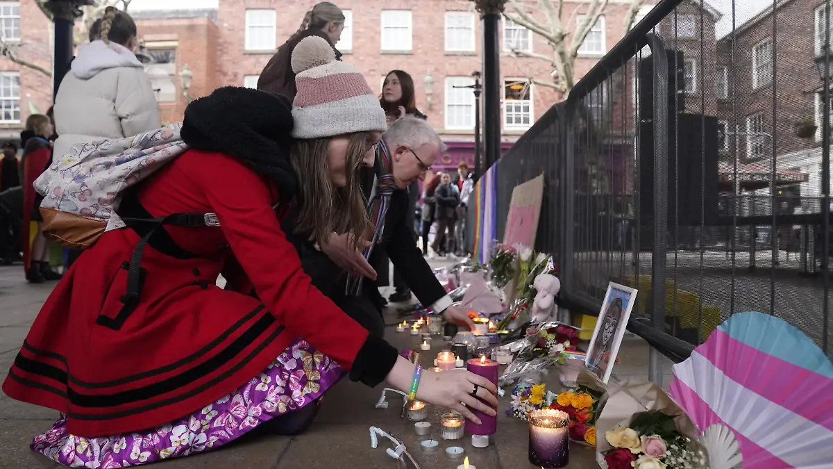 Brianna Ghey death. A members of the public attends a candle-lit vigil at Old Market Place in Warrington, in memory of transgender teenager Brianna Ghey, who was fatally stabbed in a park last Saturday. The 16-year-old from Birchwood in Warrington, Cheshire, was found as she lay wounded on a path in Linear Park, Culcheth. Picture date: Saturday February 18, 2023. Vigils organised by members of the transgender community are due to be held across the UK. See PA story POLICE Warrington. Photo credit should read: Danny Lawson/PA Wire URN:71038543