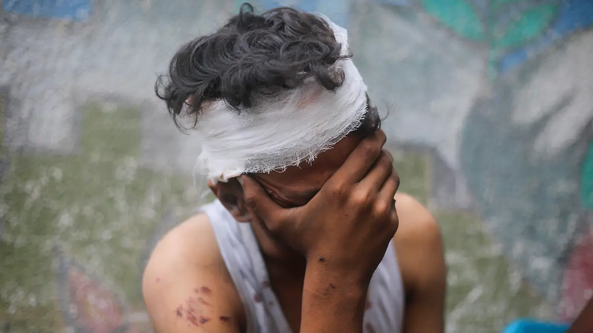 A Palestinian boy mourns his relatives killed in the Israeli bombardment of the Gaza Strip in Rafah on Oct. 23, 2023. (AP Photo/Hatem Ali)