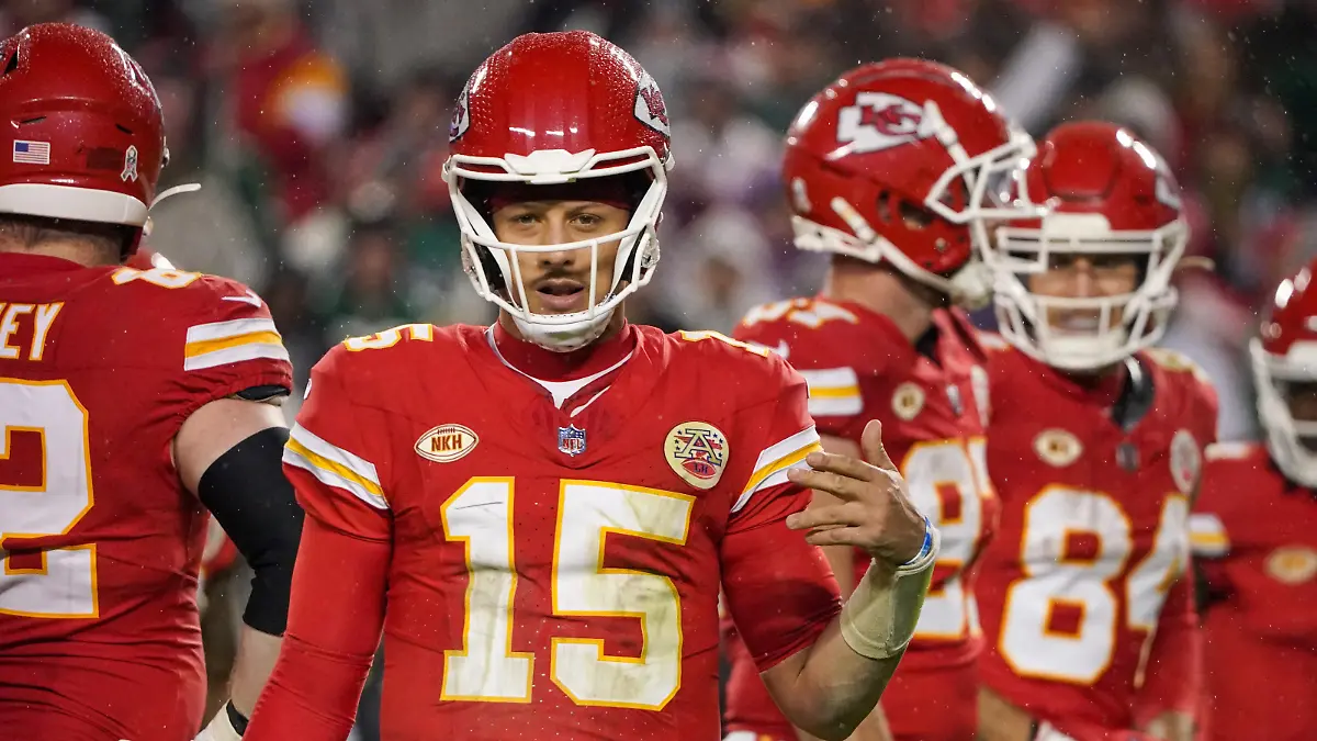 Nov 20, 2023; Kansas City, Missouri, USA; Kansas City Chiefs quarterback Patrick Mahomes (15) gestures to the sidelines against the Philadelphia Eagles during the second half at GEHA Field at Arrowhead Stadium. Mandatory Credit: Denny Medley-USA TODAY Sports