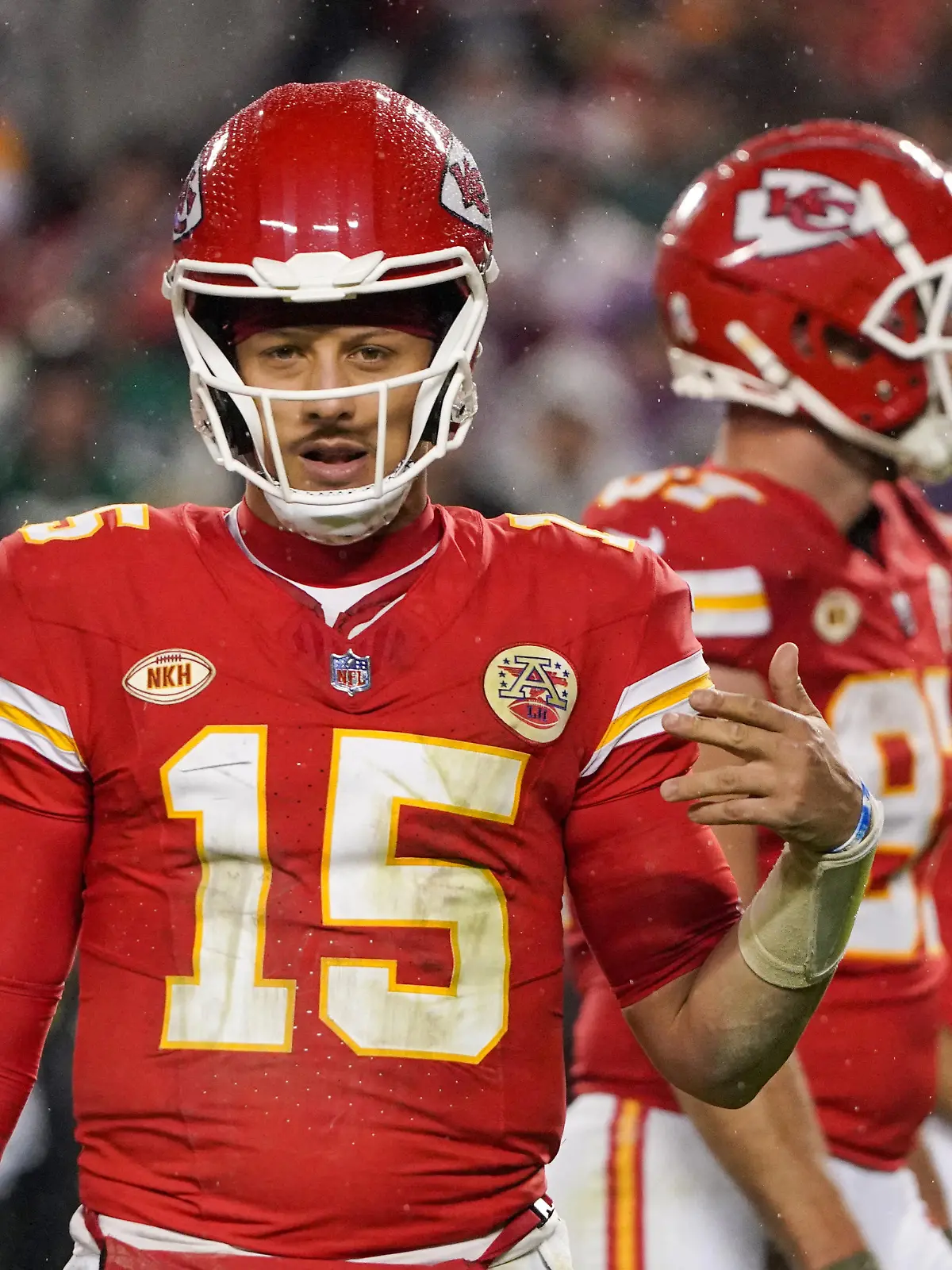 Nov 20, 2023; Kansas City, Missouri, USA; Kansas City Chiefs quarterback Patrick Mahomes (15) gestures to the sidelines against the Philadelphia Eagles during the second half at GEHA Field at Arrowhead Stadium. Mandatory Credit: Denny Medley-USA TODAY Sports