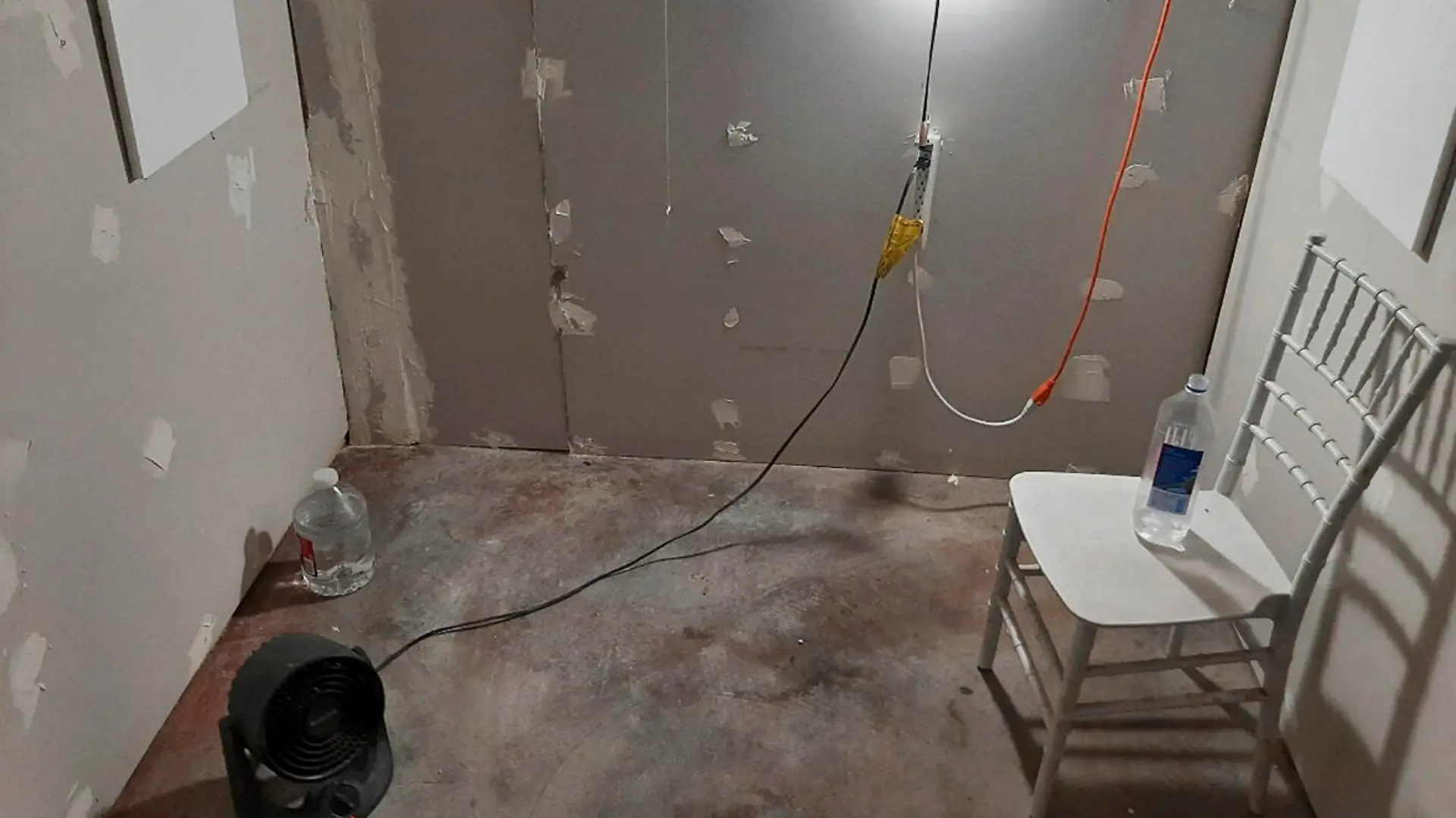 This undated photo provided by the Federal Bureau of Investigation's Portland Field Office shows the interior of a makeshift cinderblock cell in Klamath Falls, Ore., allegedly used by Negasi Zuberi. The FBI said Wednesday, Aug. 2, 2023, that Zuberi, 29, who posed as an undercover police officer kidnapped a woman in Seattle, drove her hundreds of miles to his home in Oregon, and kept her in the cell from which she eventually escaped and found help. Zuberi who was arrested faces a federal interstate kidnapping charge, and authorities said they are looking for additional victims after linking him to sexual assaults in at least four more states. (FBI via AP)