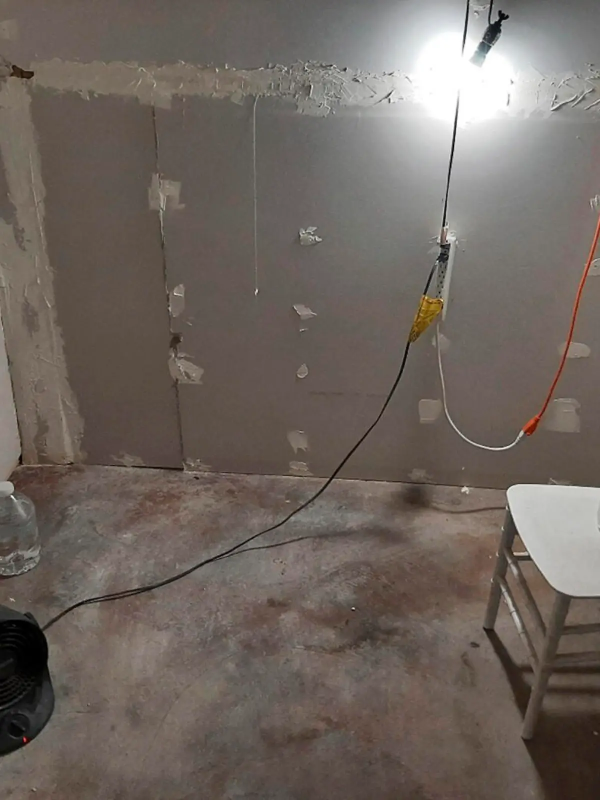 This undated photo provided by the Federal Bureau of Investigation's Portland Field Office shows the interior of a makeshift cinderblock cell in Klamath Falls, Ore., allegedly used by Negasi Zuberi. The FBI said Wednesday, Aug. 2, 2023, that Zuberi, 29, who posed as an undercover police officer kidnapped a woman in Seattle, drove her hundreds of miles to his home in Oregon, and kept her in the cell from which she eventually escaped and found help. Zuberi who was arrested faces a federal interstate kidnapping charge, and authorities said they are looking for additional victims after linking him to sexual assaults in at least four more states. (FBI via AP)