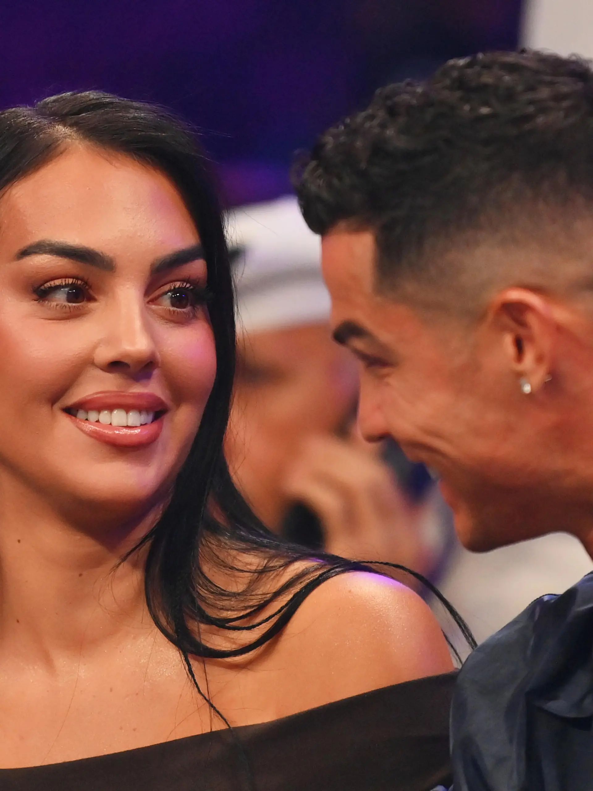 RIYADH, SAUDI ARABIA - OCTOBER 28: Cristiano Ronaldo and his wife Georgina Rodríguez speak ringside prior to the Heavyweight fight between Tyson Fury and Francis Ngannou at Boulevard Hall on October 28, 2023 in Riyadh, Saudi Arabia. (Photo by Justin Setterfield/Getty Images)