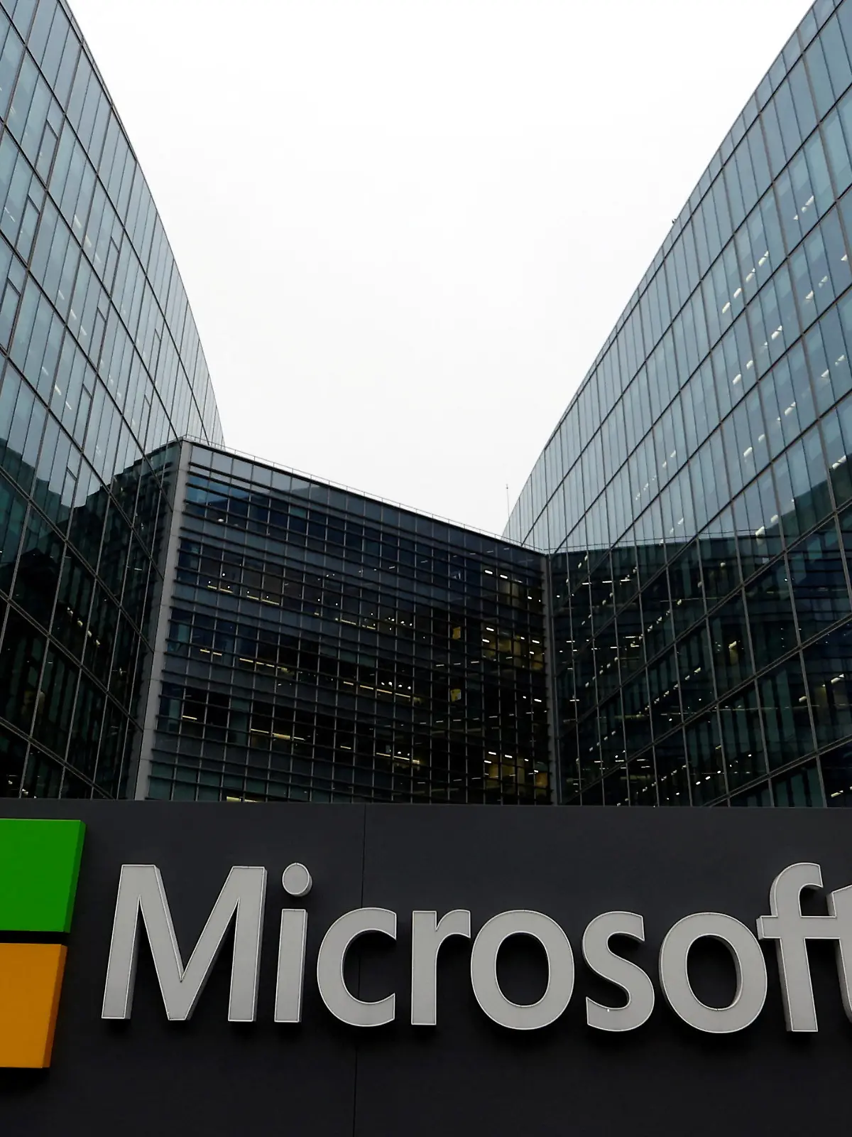 FILE PHOTO: A Microsoft sign at the U.S. tech giant's offices in Issy-les-Moulineaux, near Paris, France, January 25, 2023. REUTERS/Gonzalo Fuentes/File Photo