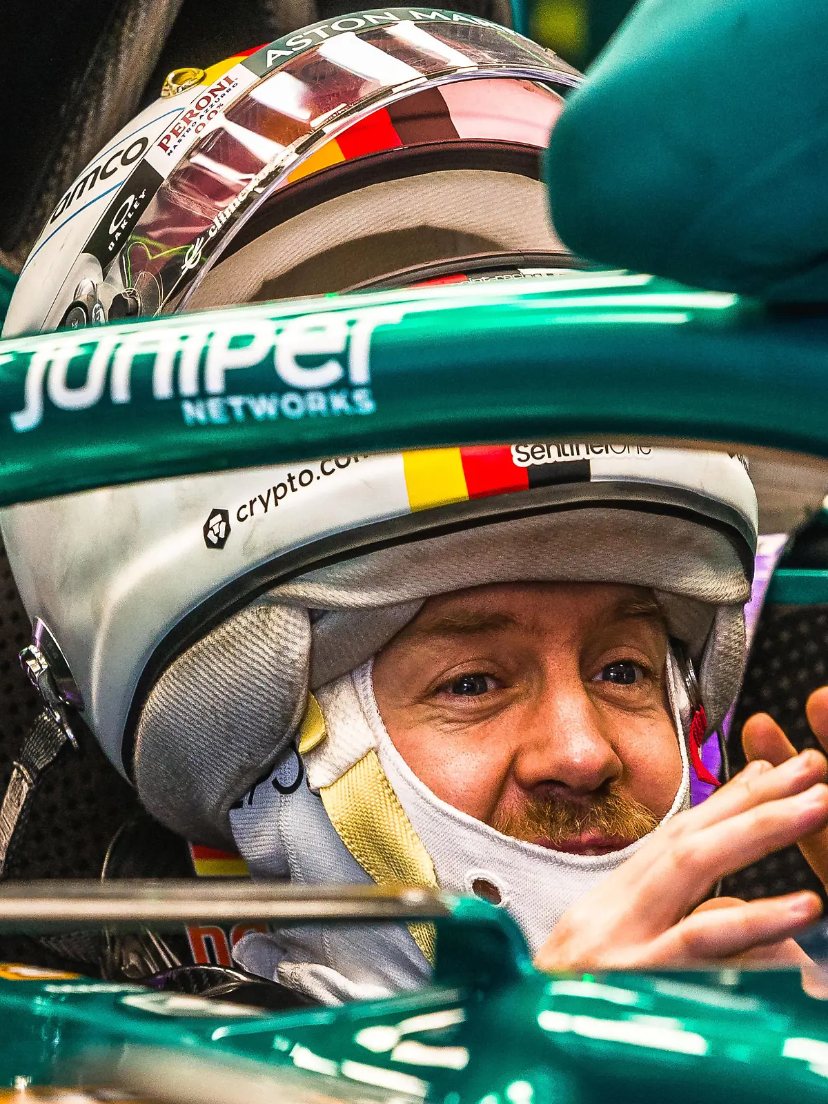  February 25, 2022, Barcelona, Catalonia, Spain: SEBASTIAN VETTEL GER from team Aston Martin talks to an engineer in the teams garage at day three of the Formula One winter testing at Circuit de Catalunya Barcelona Spain - ZUMAo105 20220225_zap_o105_036 Copyright: xMatthiasxOesterlex