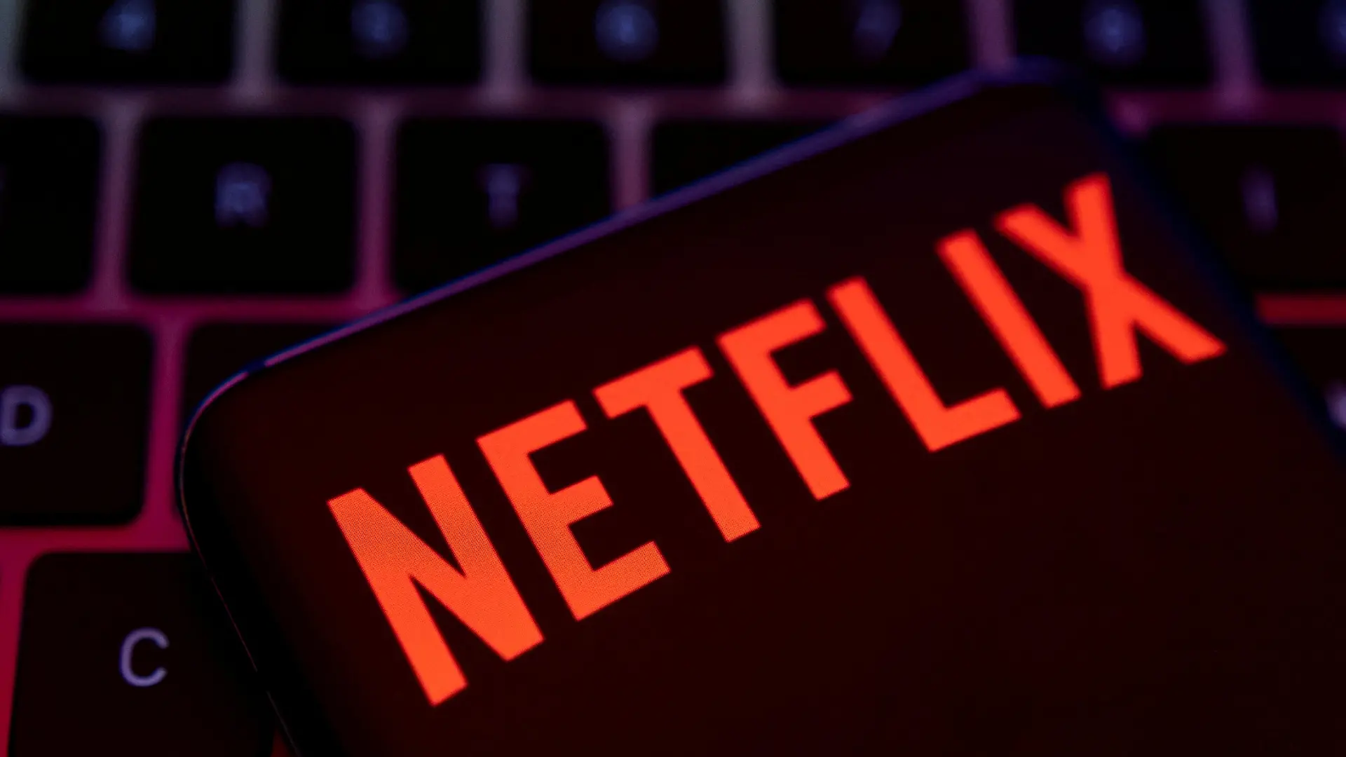 FILE PHOTO: Smartphone with Netflix logo is placed on a keyboard in this illustration taken April 19, 2022. REUTERS/Dado Ruvic/File Photo