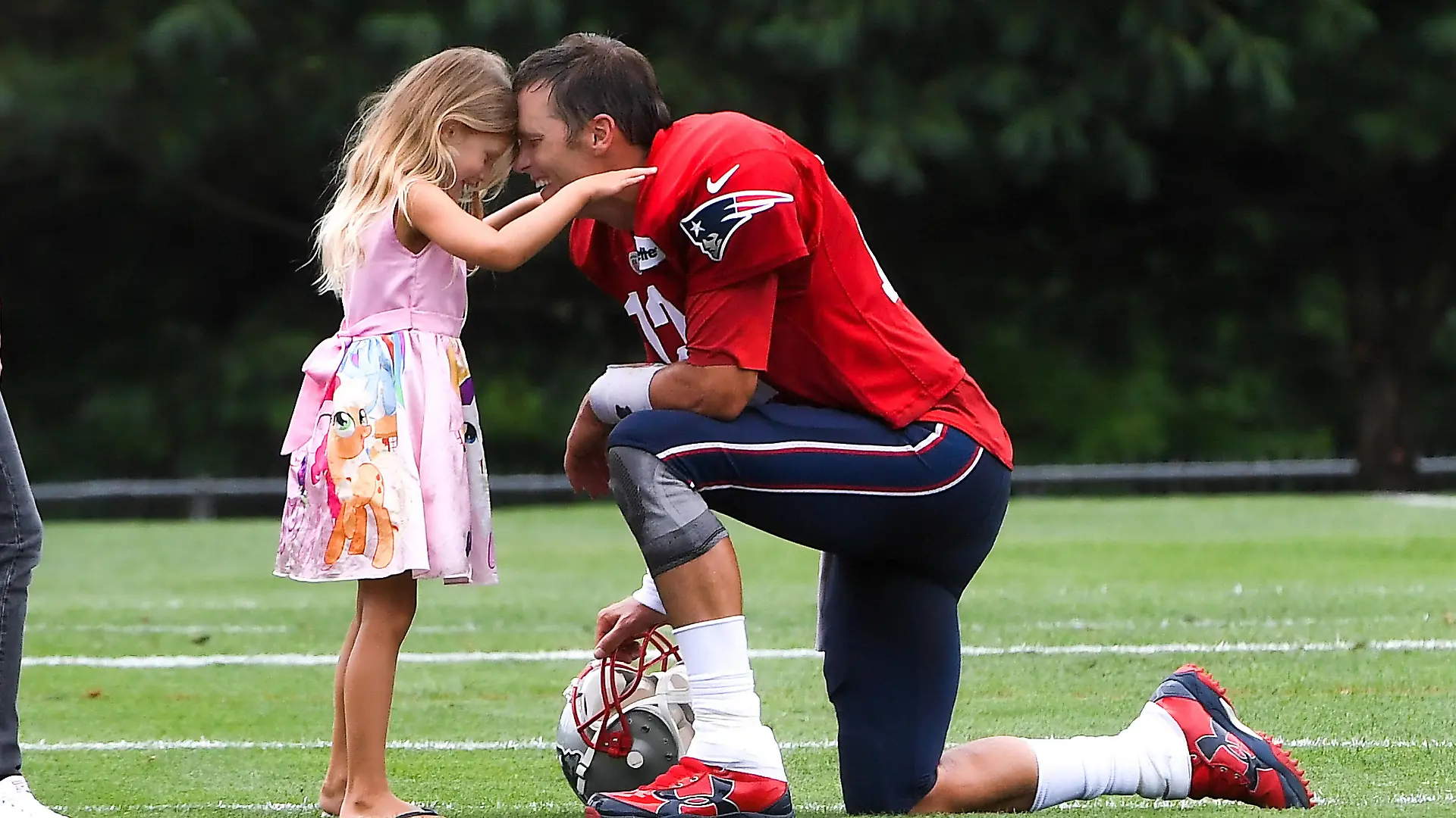 January 29, 2022: Multiple sources report that seven time Super Bowl Champion, Tom Brady, will announce his retirement from the NFL, American Football Herren, USA /CSM..August 1, 2018: New England Patriots quarterback Tom Brady 12 shares a moment with his daughter Vivian Lake Brady at the New England Patriots training camp held on the practice fields at Gillette Stadium, in Foxborough, Massachusetts. /CSM Foxborough USA - ZUMAc04_ 20220129_zaf_c04_233 Copyright: xEricxCanhax
