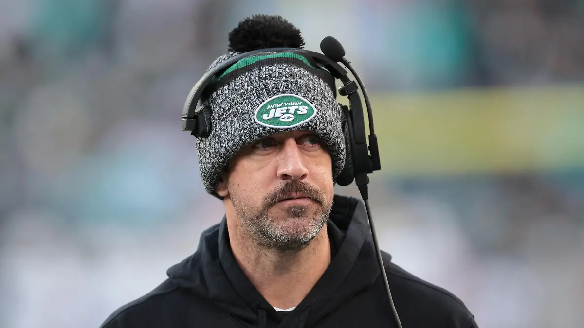 Nov 24, 2023; East Rutherford, New Jersey, USA; New York Jets quarterback Aaron Rodgers (8) on the sidelines during the first half against the Miami Dolphins at MetLife Stadium. Mandatory Credit: Vincent Carchietta-USA TODAY Sports