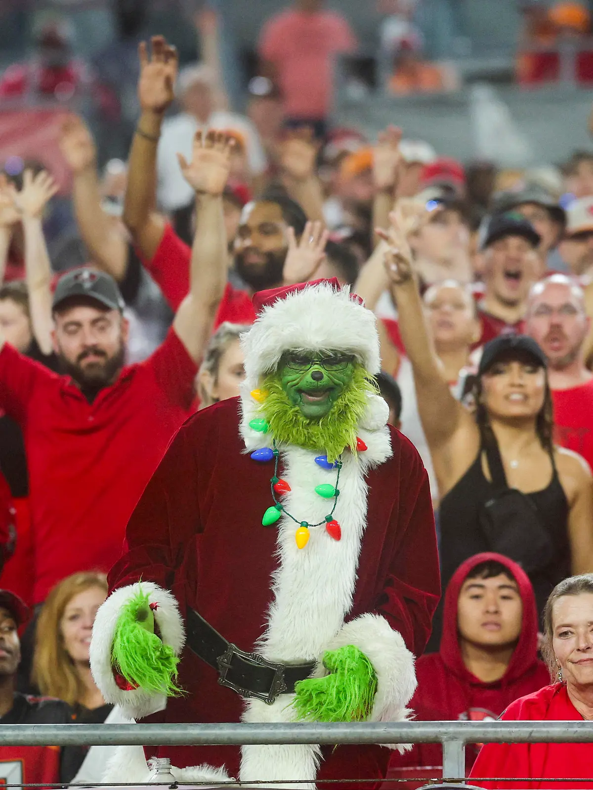 Dec 3, 2023; Tampa, Florida, USA;  fans react to a Tampa Bay Buccaneers touchdown against the Carolina Panthers in the third quarter at Raymond James Stadium. Mandatory Credit: Nathan Ray Seebeck-USA TODAY Sports