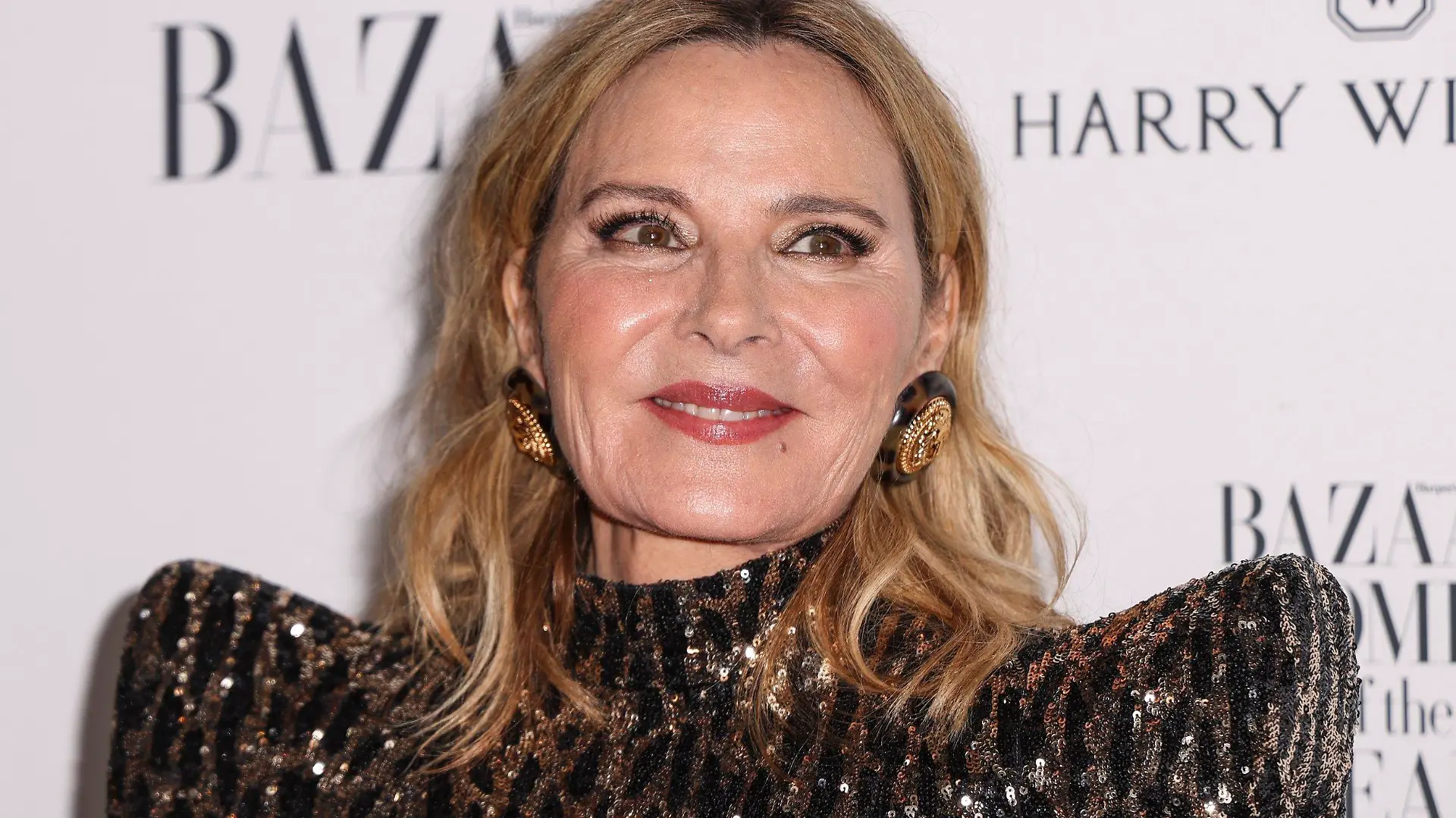 Kim Cattrall poses for photographers upon arrival at the Harper's Bazaar Women of the Year event on Tuesday, Nov. 7, 2023 in London. (Vianney Le Caer/Invision/AP)