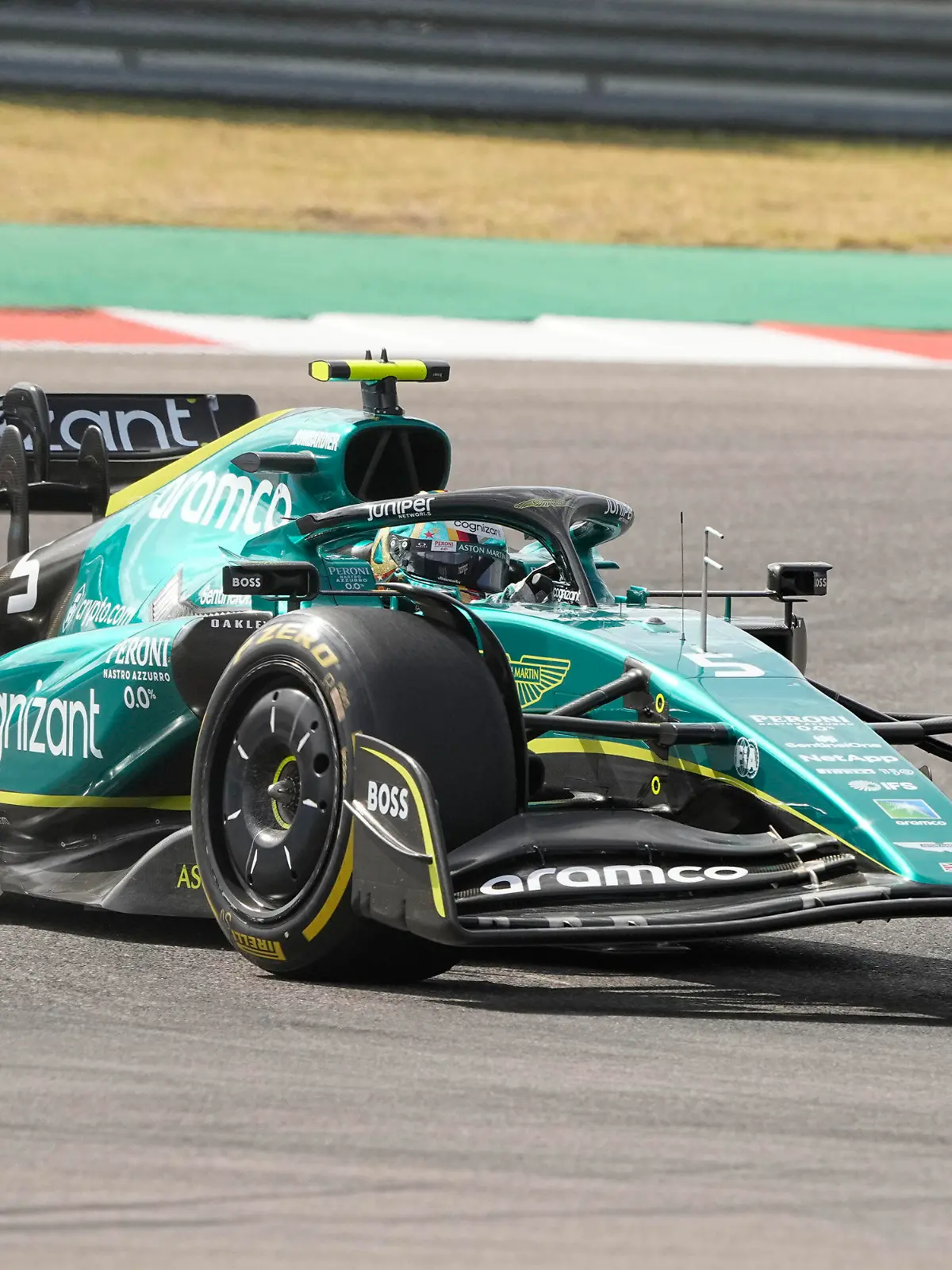 Aston Martin driver Sebastian Vettel, of Germany, moves into Turn 1 during the Formula One U.S. Grand Prix auto race at Circuit of the Americas, Sunday, Oct. 23, 2022, in Austin, Texas. (AP Photo/Eric Gay)