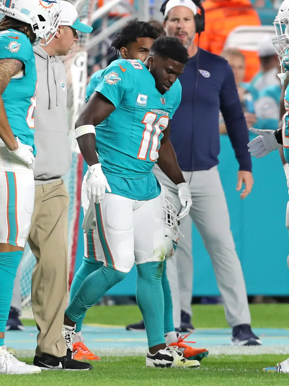 December 11, 2023, Miami Gardens, Florida, USA: Miami Dolphins wide receiver Tyreek Hill is helped off the field during the first half against the Tennessee Titans at Hard Rock Stadium on Monday, Dec. 11, 2023, in Miami Gardens, Florida. Miami Gardens USA - ZUMAm67_ 20231211_zaf_m67_031 Copyright: xJohnxMccallx