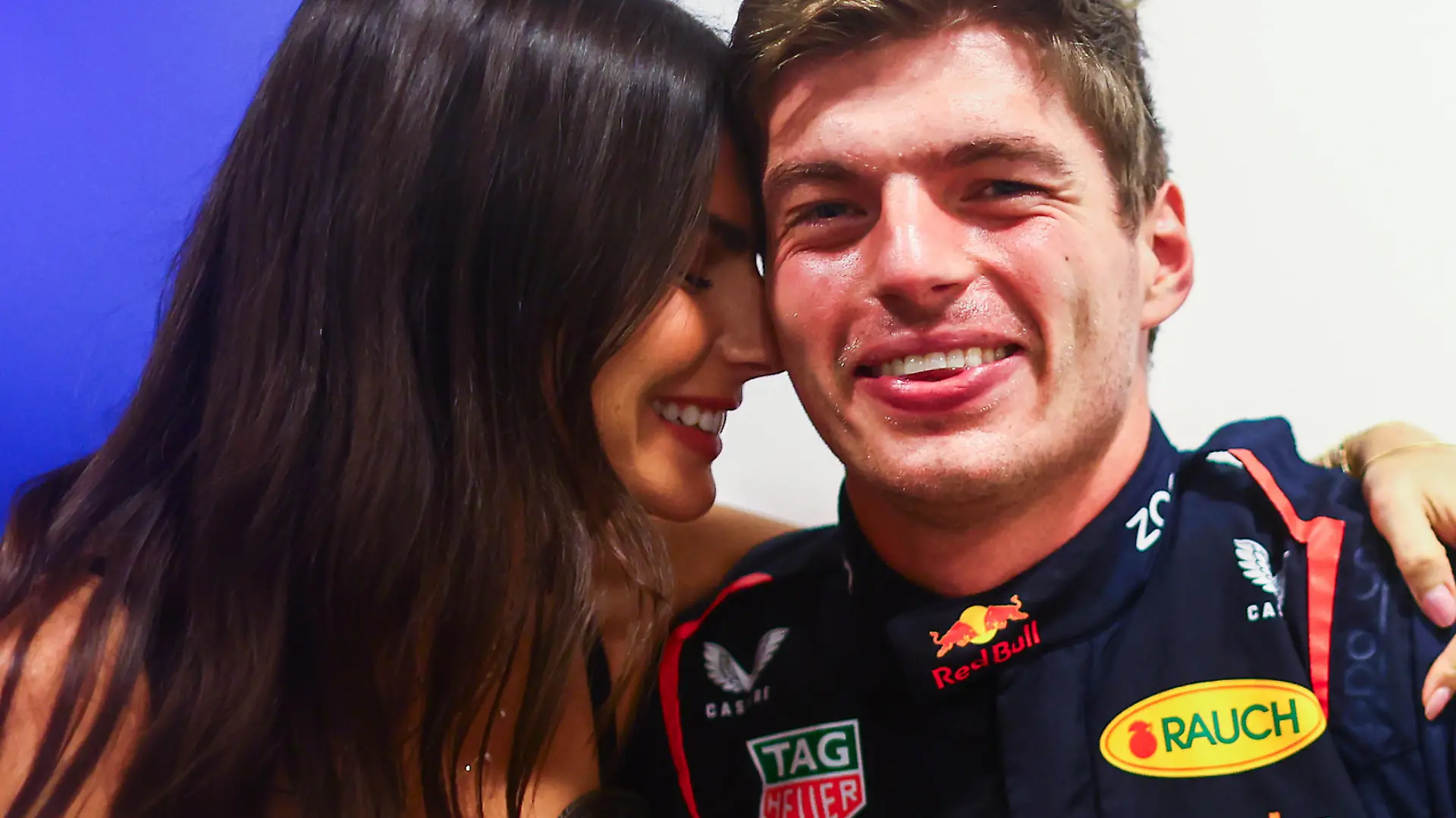 ABU DHABI, UNITED ARAB EMIRATES - NOVEMBER 26: Race winner Max Verstappen of the Netherlands and Oracle Red Bull Racing and Kelly Piquet pose for a photo after the F1 Grand Prix of Abu Dhabi at Yas Marina Circuit on November 26, 2023 in Abu Dhabi, United Arab Emirates. (Photo by Mark Thompson/Getty Images)