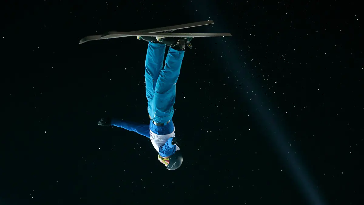 Maxim Gustik, of Belarus, competes to place the third at the freestyle aerials skiing World Cup city event, in Moscow, Russia, on Saturday, Feb. 21, 2015.(AP Photo/Ivan Sekretarev)