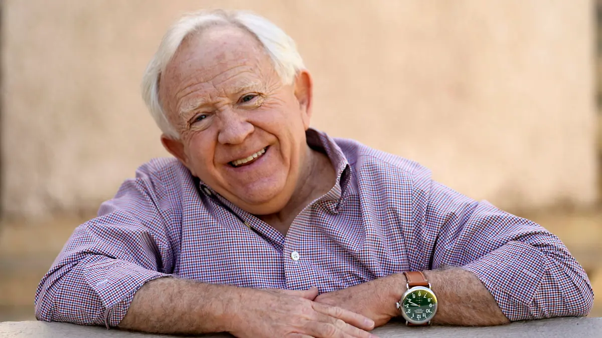 FILE - Leslie Jordan poses for a portrait at Pan Pacific Park in the Fairfax district of Los Angeles on Thursday, April 8, 2021 to promote his new book "How Y'all Doing?: Misadventures and Mischief from a Life Well Lived." Jordan, the Emmy-winning actor whose wry Southern drawl and versatility made him a comedy and drama standout on TV series including “Will & Grace” and “American Horror Story,” has died. He was 67. (AP Photo/Damian Dovarganes, File)