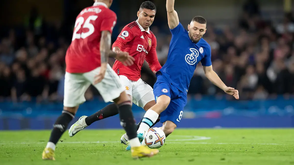Mandatory Credit: Photo by Mark Greenwood/IPS/Shutterstock 13486409m Mateo Kovacic of Chelsea is fouled by Casemiro of Manchester United, ManU Chelsea v Manchester United, Premier League, Football, Stamford Bridge, London, UK - 22 Oct 2022 EDITORIAL USE ONLY No use with unauthorised audio, video, data, fixture lists outside the EU, club/league logos or live services. Online in-match use limited to 45 images 15 in extra time. No use to emulate moving images. No use in betting, games or single club/league/player publications/services. Chelsea v Manchester United, Premier League, Football, Stamford Bridge, London, UK - 22 Oct 2022 EDITORIAL USE ONLY No use with unauthorised audio, video, data, fixture lists outside the EU, club/league logos or live services. Online in-match use limited to 45 images 15 in extra time. No use to emulate moving images. No use in betting, games or PUBLICATIONxINxGERxSUIxAUTXHUNxGRExMLTxCYPxROMxBULxUAExKSAxONLY Copyright: xMarkxGreenwood/IPS/Shutterstockx 13486409m