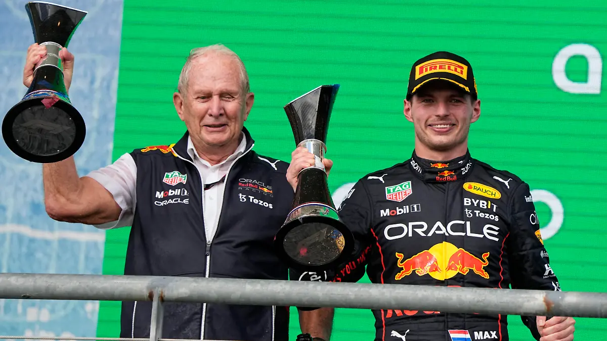 Red Bull driver Max Verstappen, of the Netherlands, right, and Helmut Marko, left, head of Red Bull Motorsports, pose with trophies after the Formula One U.S. Grand Prix auto race at the Circuit of the Americas, Sunday, Oct. 23, 2022, in Austin, Texas. (AP Photo/Charlie Neibergall)