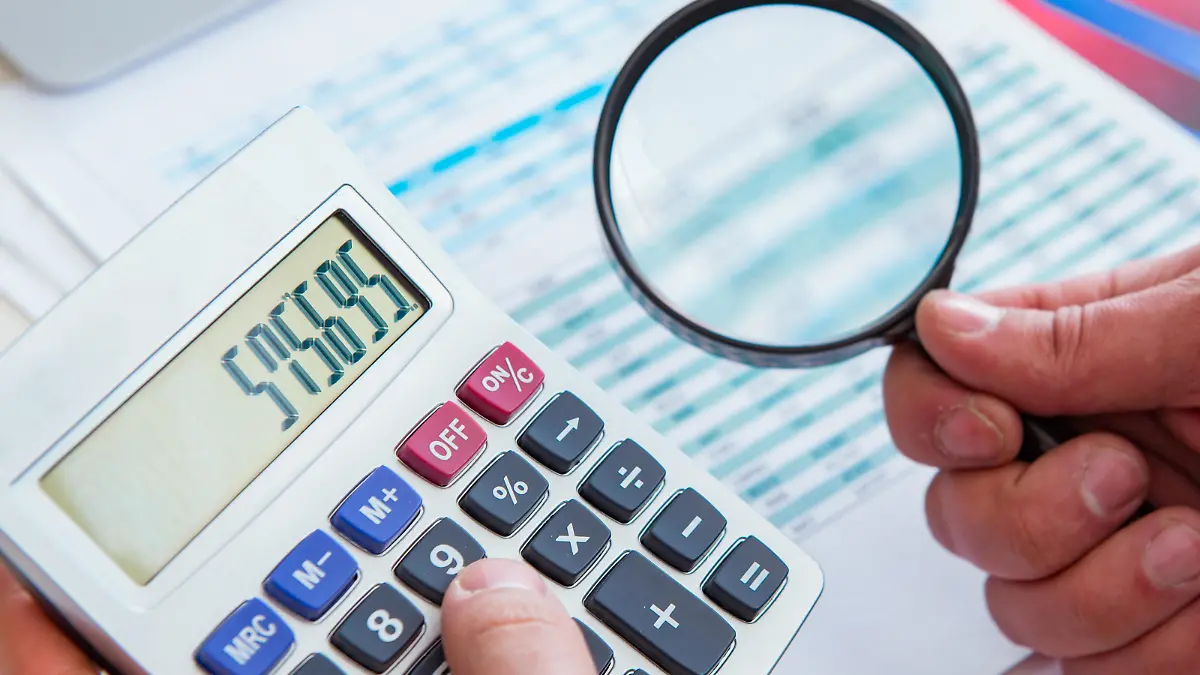 The finance analyst looking and financial reports