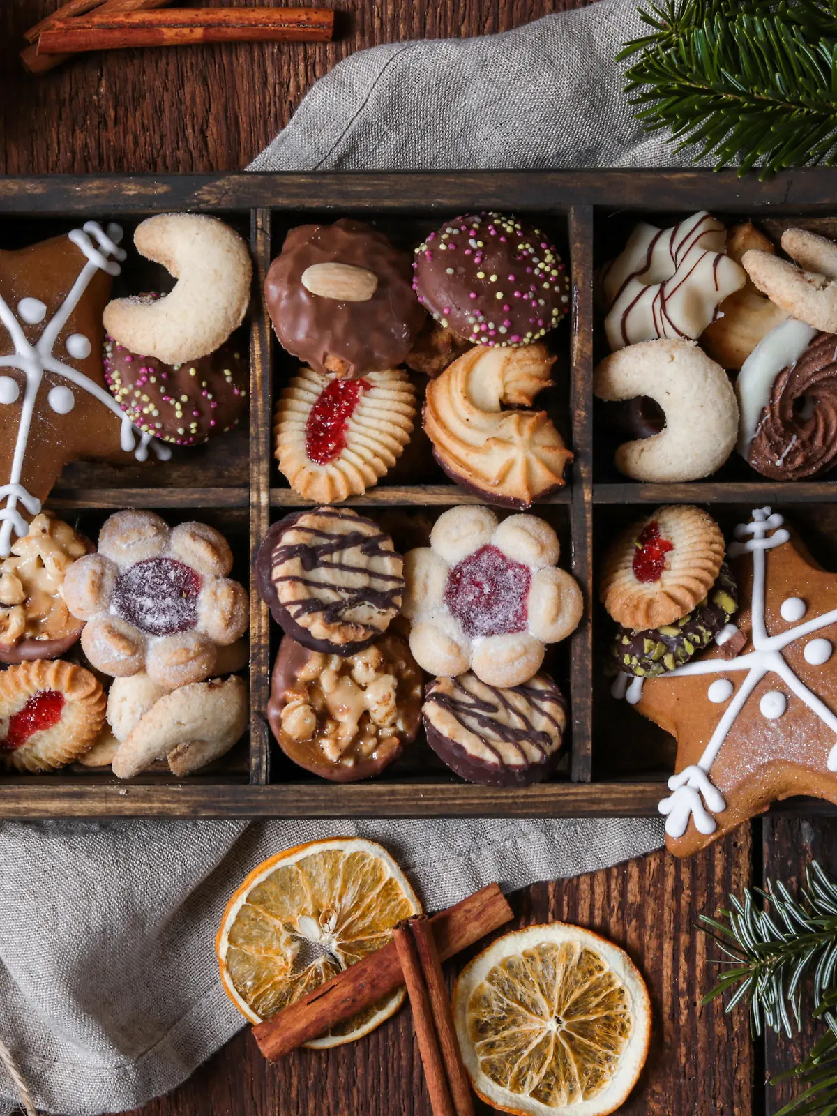 christmas cookie box with gingerbread in rustic wood kitchen