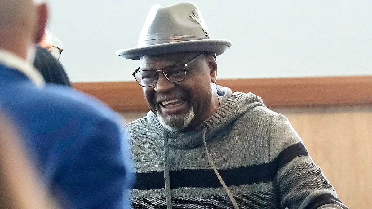 Glynn Simmons reacts after stepping out of the courthouse after Judge Amy Palumbo ruled to approve his "actual innocence" claim during a hearing at the Oklahoma County Courthouse Tuesday, Dec. 19, 2023, in Oklahoma City, Okla. (Doug Hoke/The Oklahoman via AP)