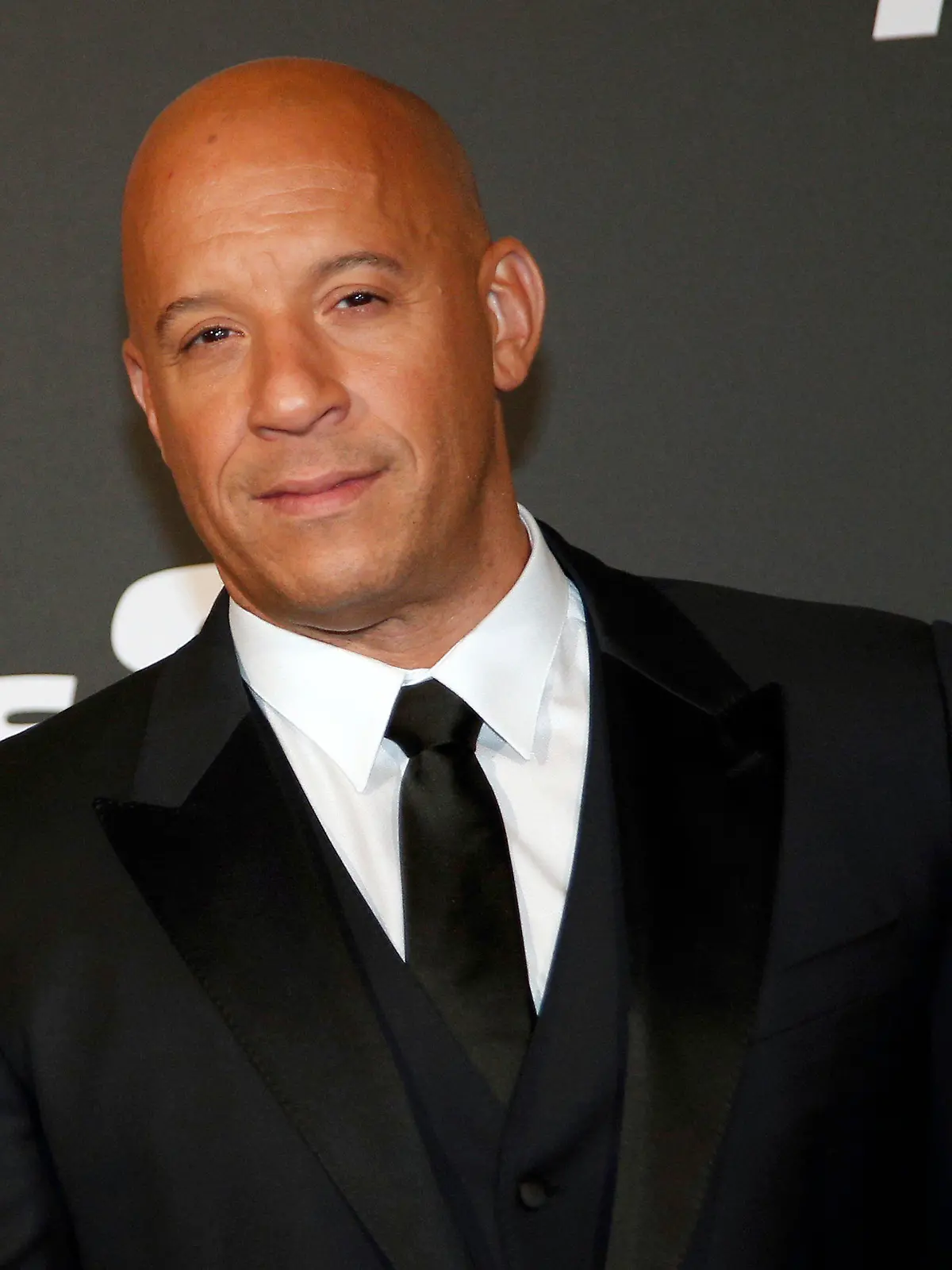 FILE - Vin Diesel poses during the premiere of Fast and Furious 8, in Paris, April 5, 2017.  The actor has been accused by his former assistant of sexual battery while working for him in 2010. Astra Jonasson filed a lawsuit in Los Angeles on Thursday, Dec. 21, 2023, alleging that Diesel forced himself onto her in a hotel suite in Atlanta.(AP Photo/Thibault Camus, File)
