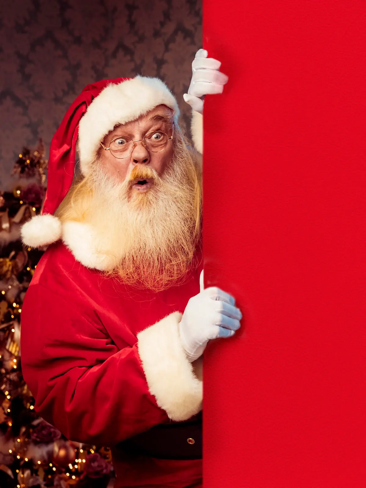 Santa with blank empty red poster