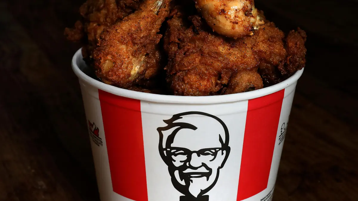 FILE PHOTO: A Kentucky Fried Chicken (KFC) bucket of mixed fried and grilled chicken is seen in this picture illustration taken April 6, 2017. REUTERS/Carlo Allegri/File Photo