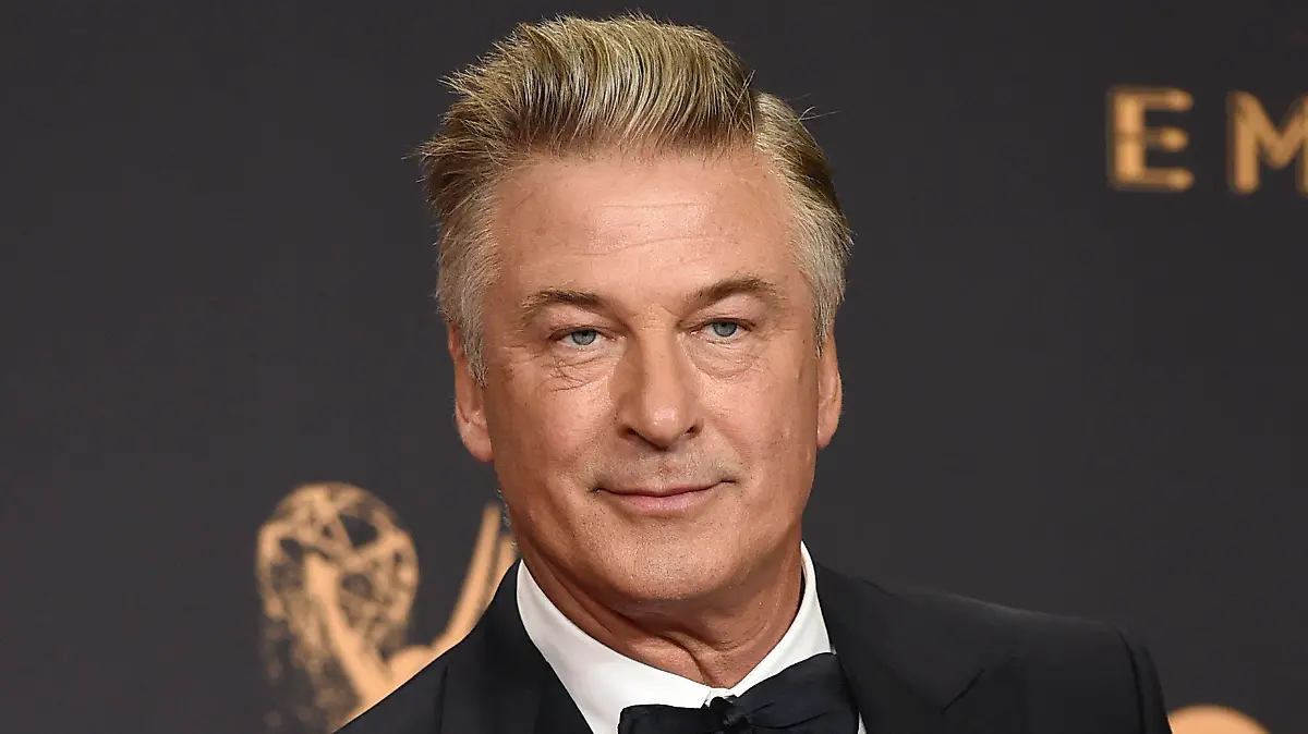 FILE - Alec Baldwin poses in the press room with the award for outstanding supporting actor in a comedy series for "Saturday Night Live" at the 69th Primetime Emmy Awards in Los Angeles on Sept. 17, 2017. The family of a cinematographer shot and killed by Alec Baldwin on the set of the film “Rust” has agreed to settle a lawsuit against Baldwin and the movie's producers, and production will resume on the project. (Photo by Jordan Strauss/Invision/AP, File)