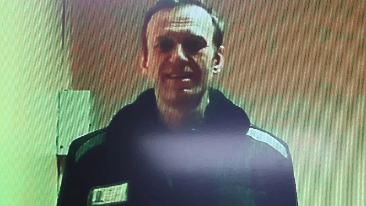 FILE PHOTO: Russian opposition leader Alexei Navalny is seen on a screen via video link from a penal colony in the Vladimir Region during a hearing at the Basmanny district court in Moscow, Russia April 26, 2023. REUTERS/Yulia Morozova/File Photo