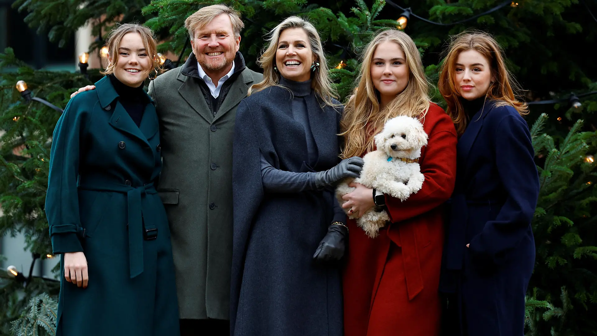 Dutch King Willem-Alexander and Queen Maxima pose with their children, Crown Princess Amalia, Princesses Alexia, Ariane and dog Mambo during an official photo session in The Hague, Netherlands December 22, 2023. REUTERS/Piroschka van de Wouw