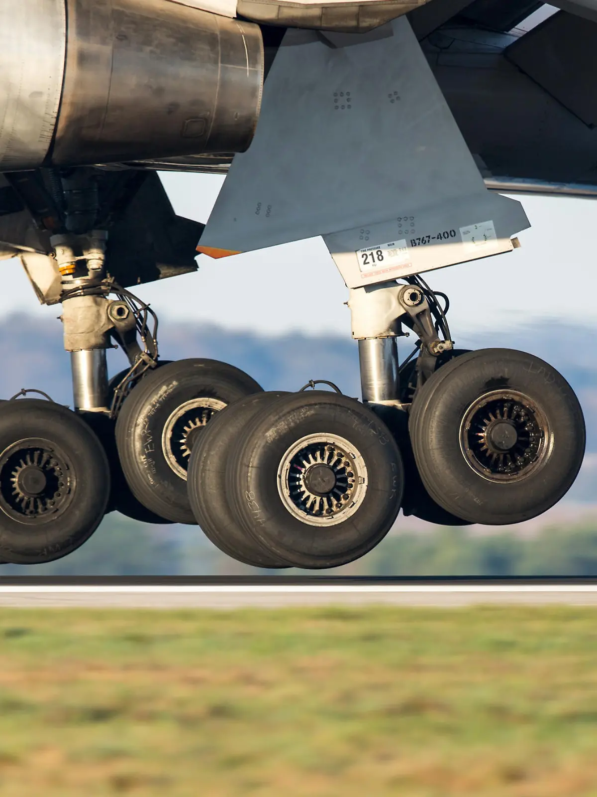 Zürich, Switzerland - March 31, 2016: Detail shot of the main landing gear on a Boeing 767-400 of United Airlines. The landing gear is the undercarriage of an aircraft or spacecraft, and is used in both takeoff and landing.
