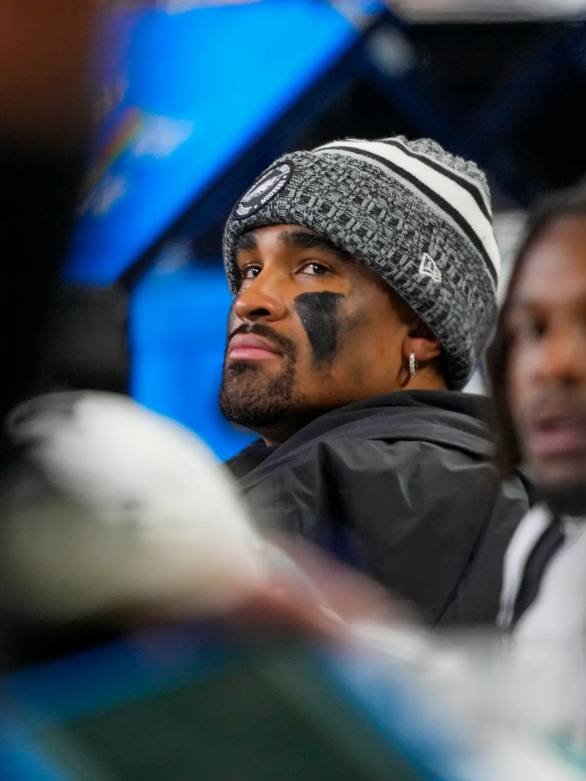 Philadelphia Eagles quarterback Jalen Hurts looks on from the bench during the first half of an NFL football game against the Seattle Seahawks, Monday, Dec. 18, 2023, in Seattle. (AP Photo/Lindsey Wasson)